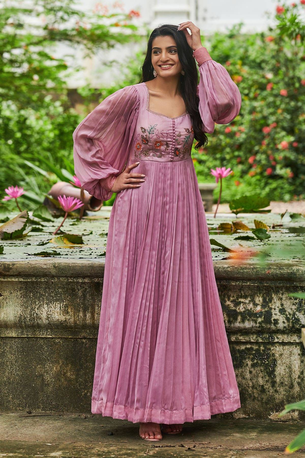 a woman in pink dress