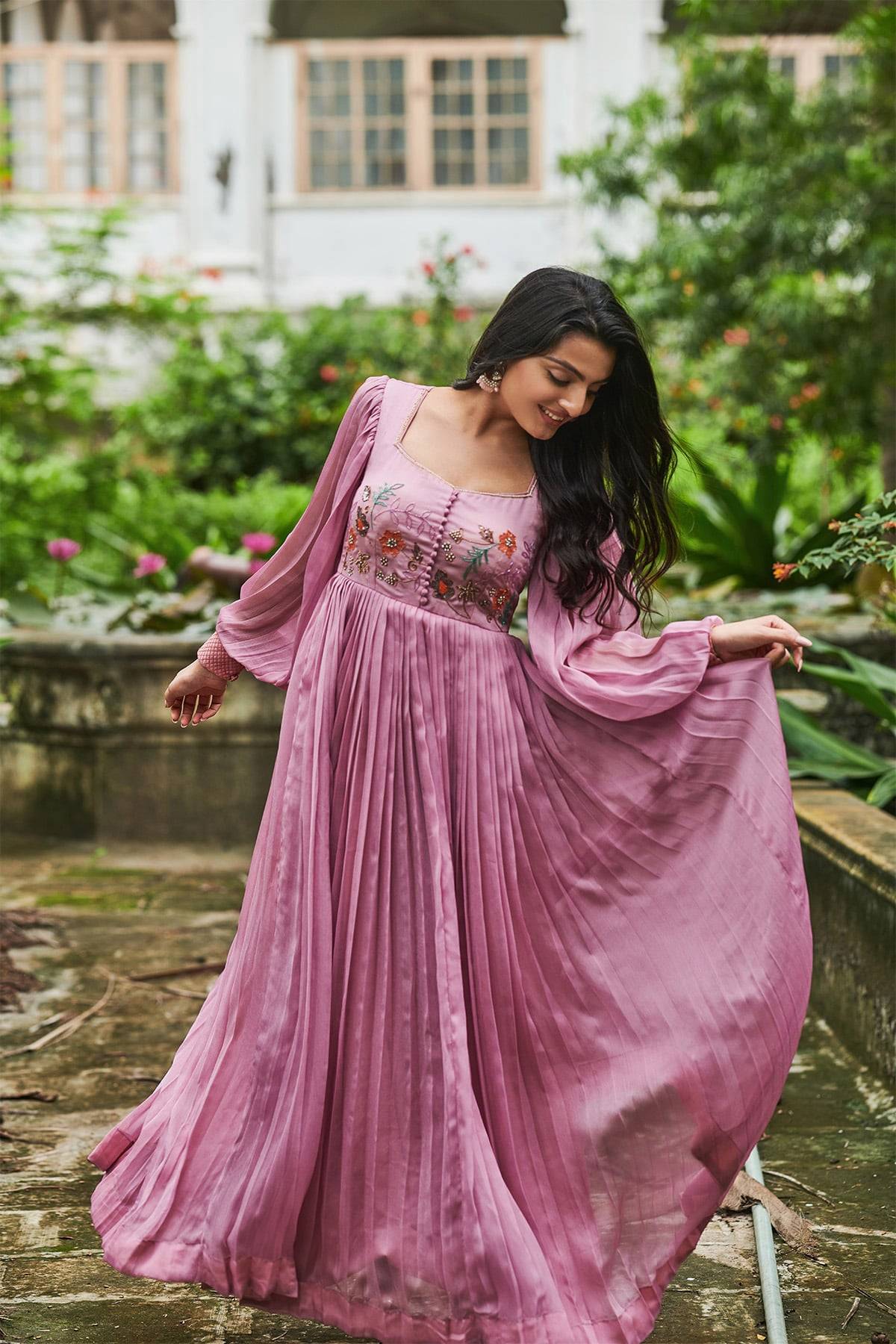 a woman in pink dress