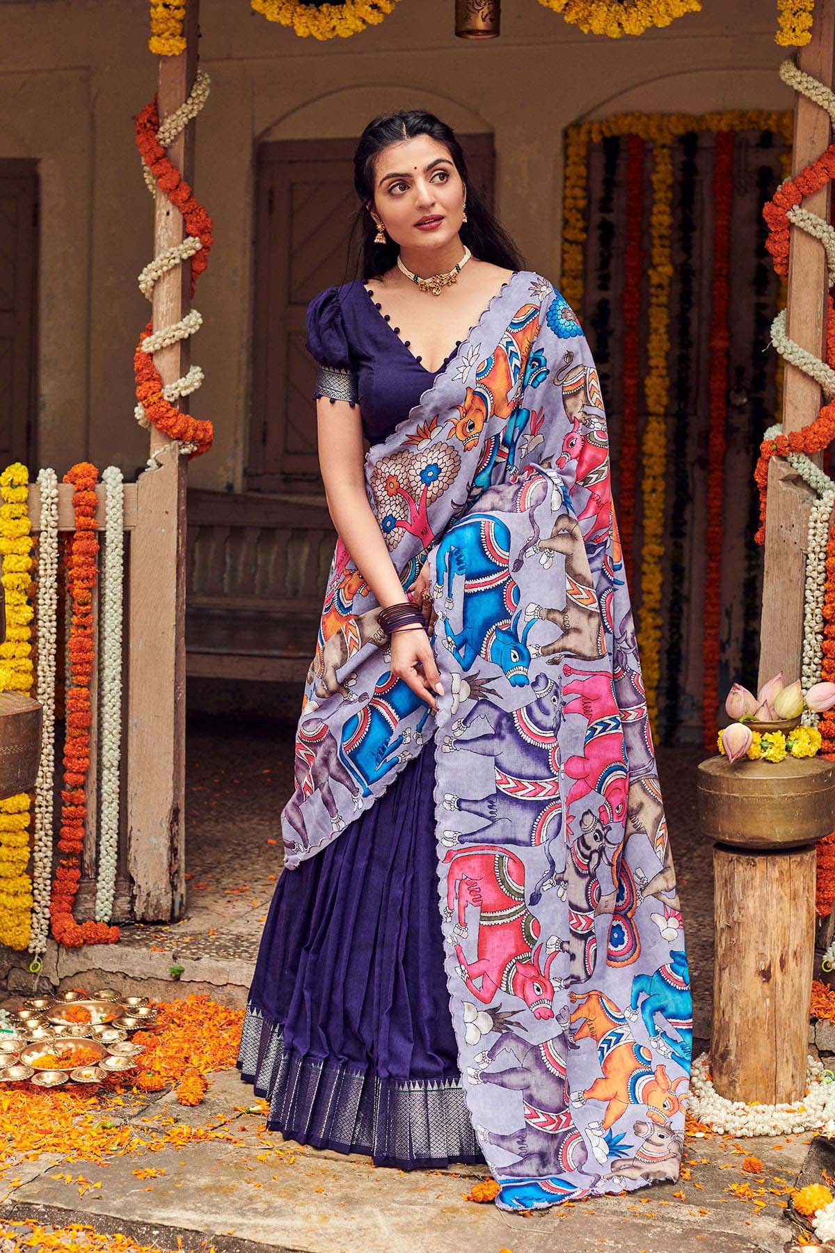 a women in a Blue Lehenga set and cotton dupatta dress name Admiral Blue Narayanpet Lehenga Set