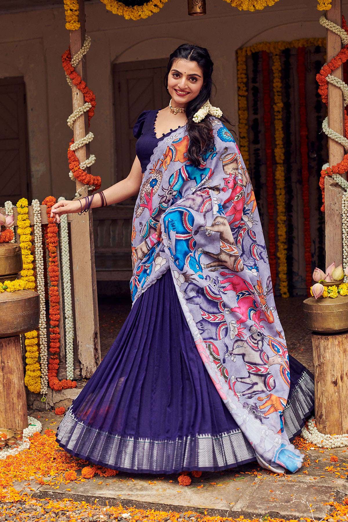 a women in a Lehenga Set from the collection of the lehengas at Bullionknot