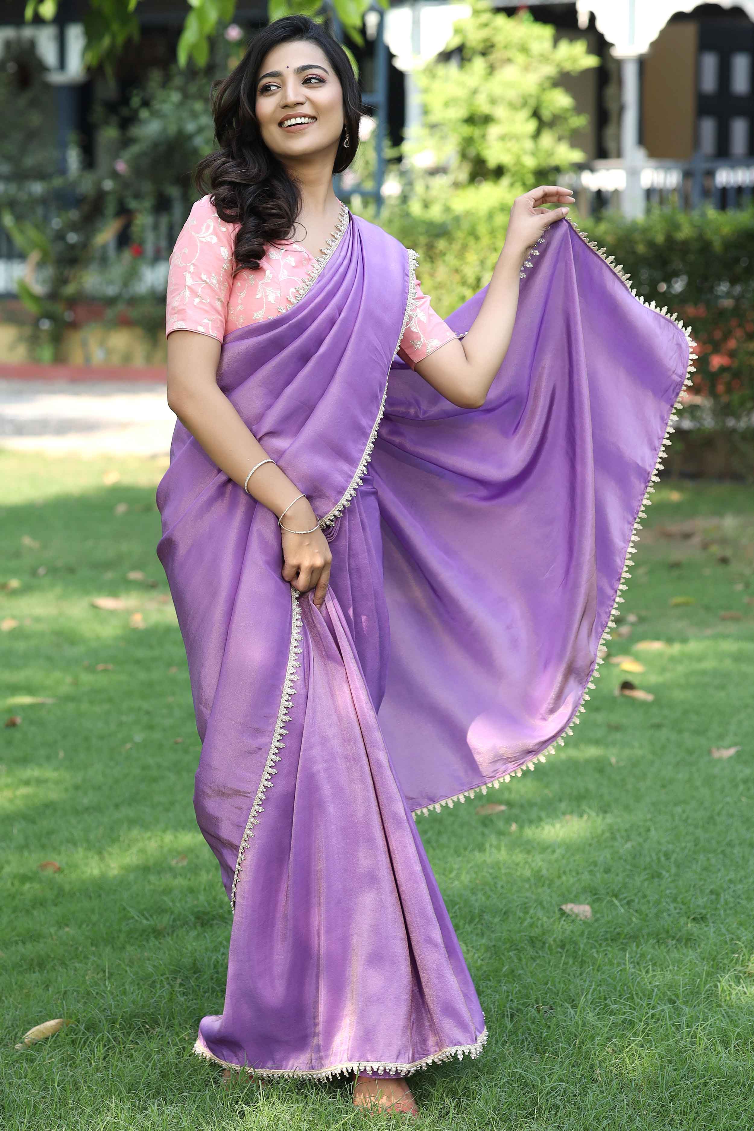 a woman in silk saree