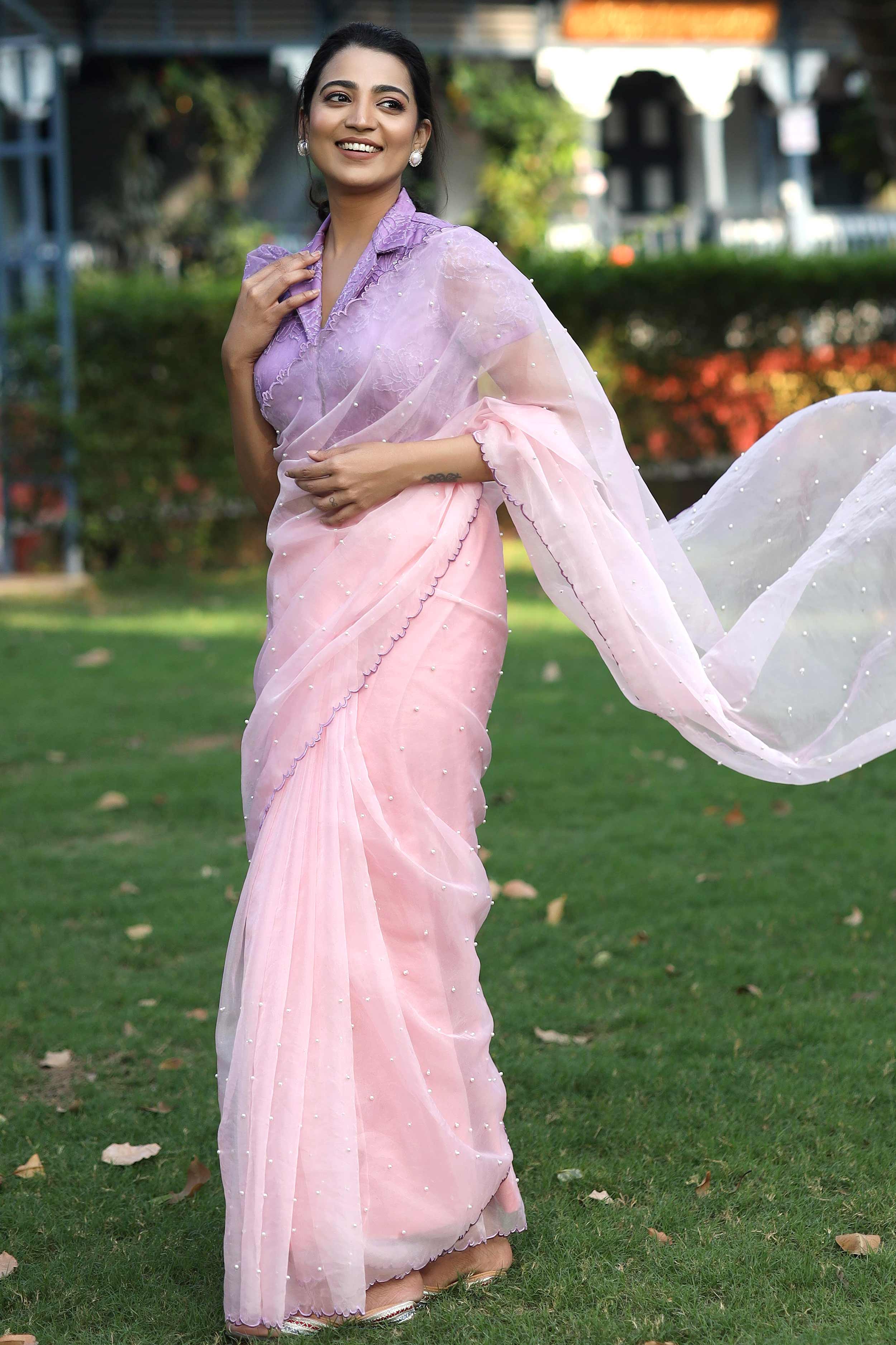 a woman in Organza saree