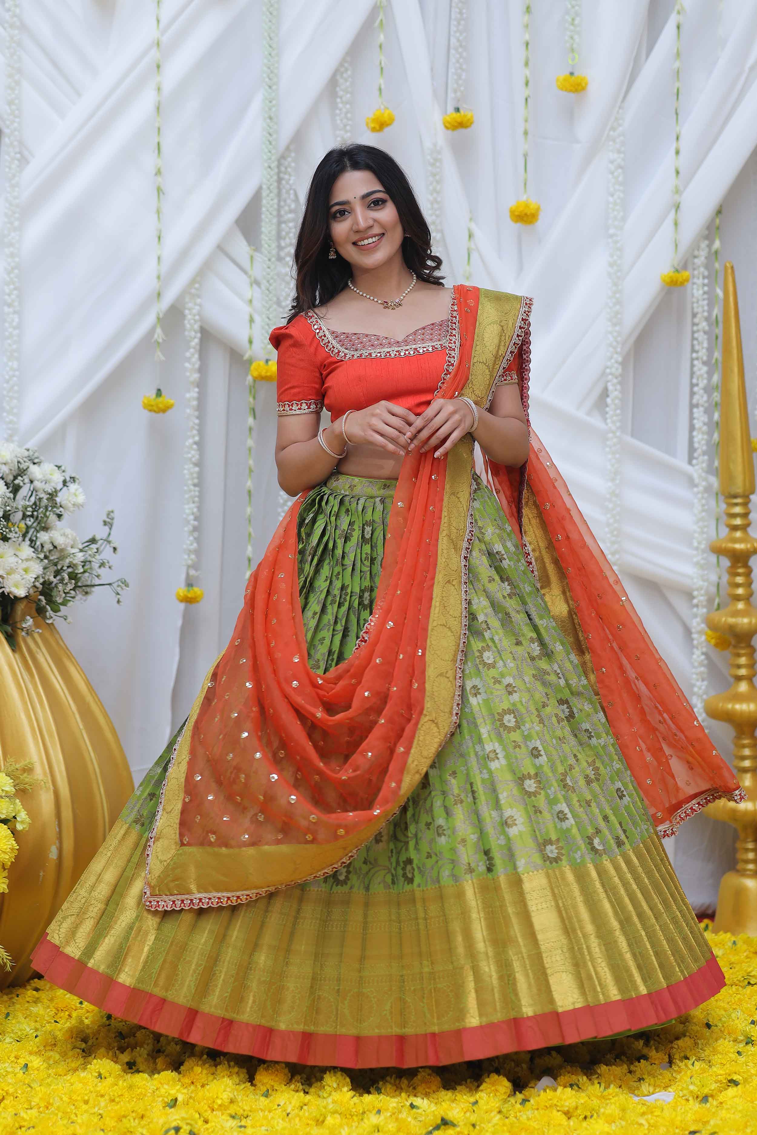 green and orange banarasi silk saree