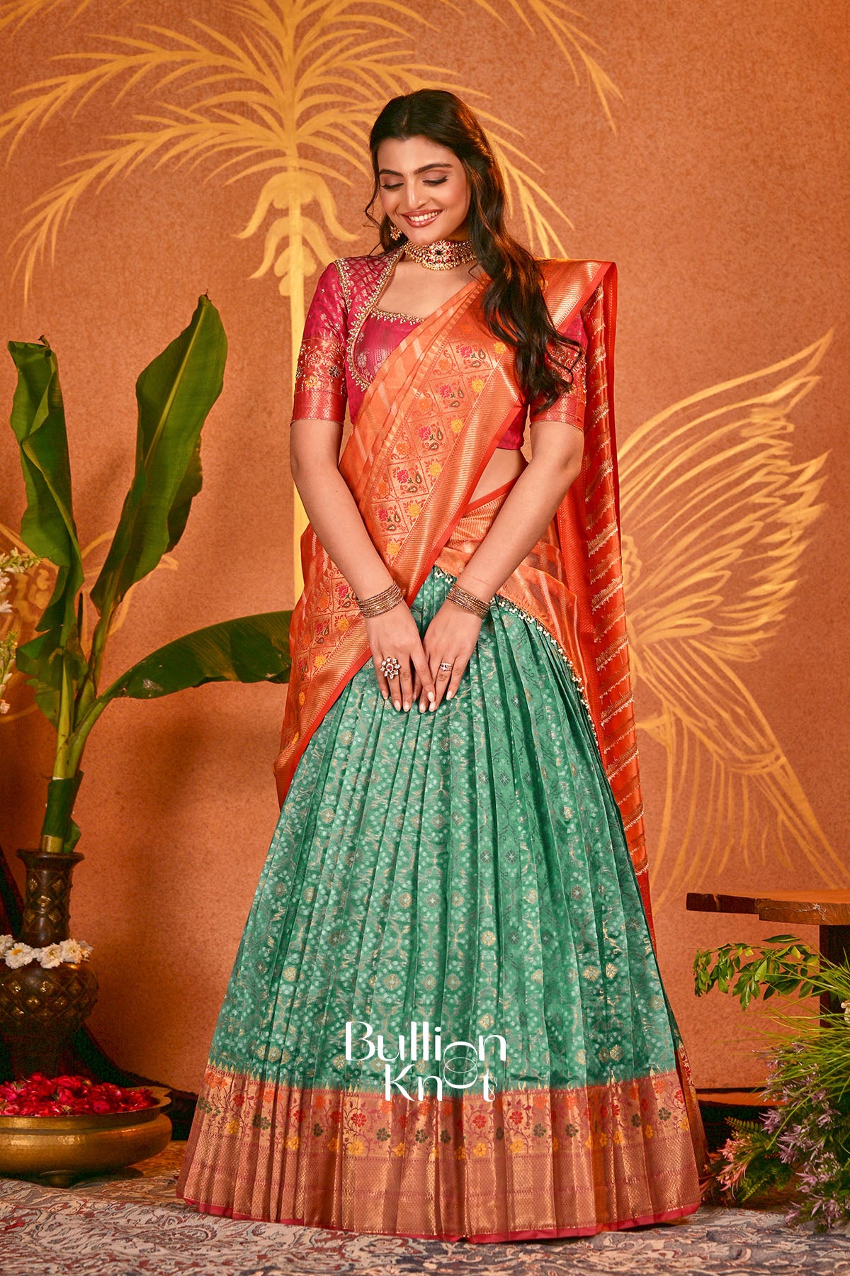 Mandira Orange Patola Silk Lehenga Set
