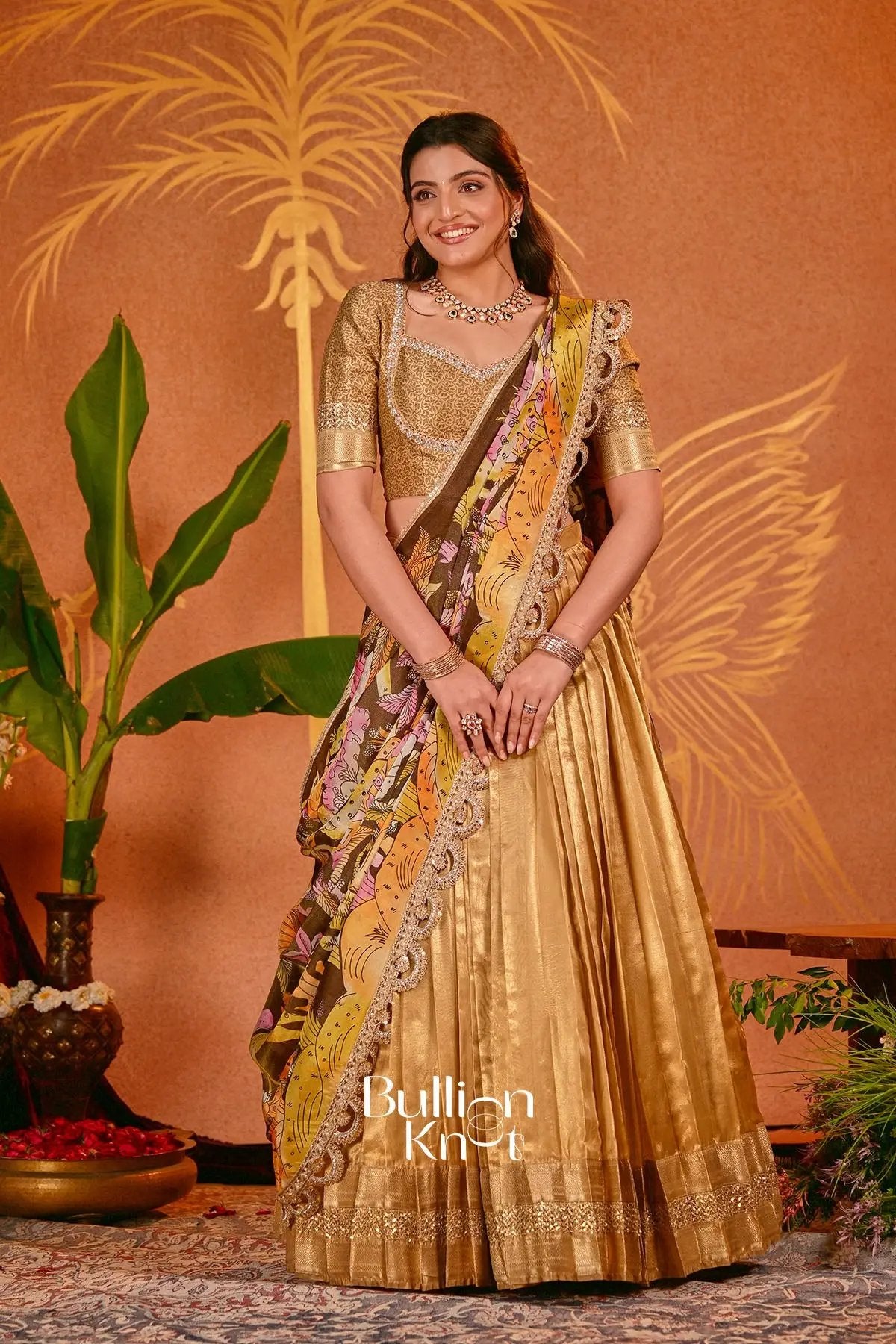 Golden silk lehenga with floral dupatta for traditional wear