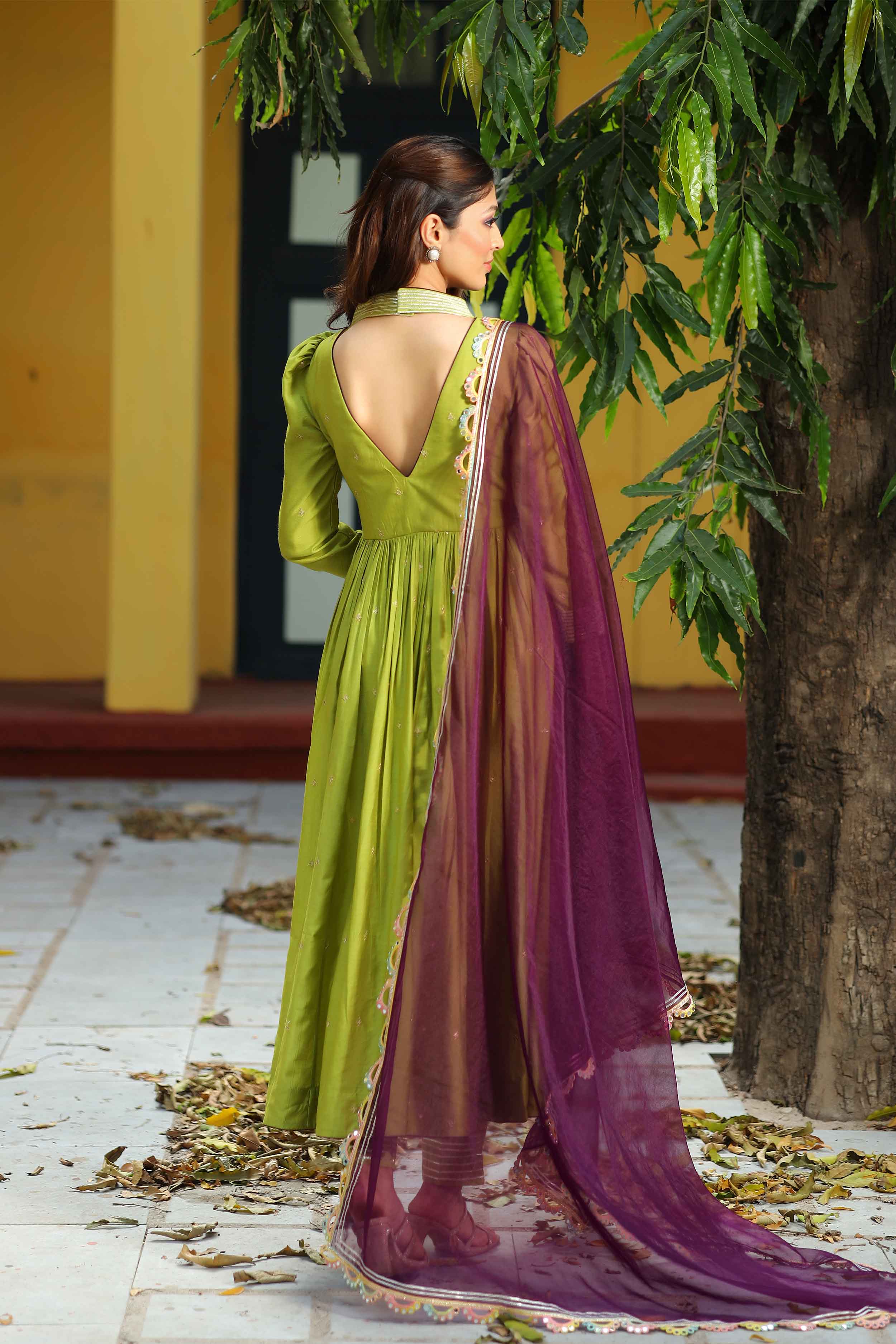 a woman in green Anarkali Dress