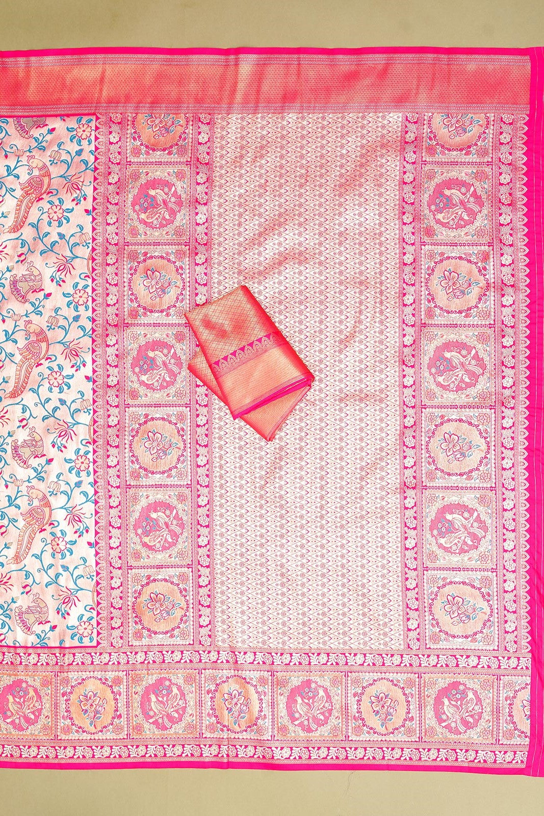 Kanchipuram Tissue Pink and Jade Green Jaal Saree