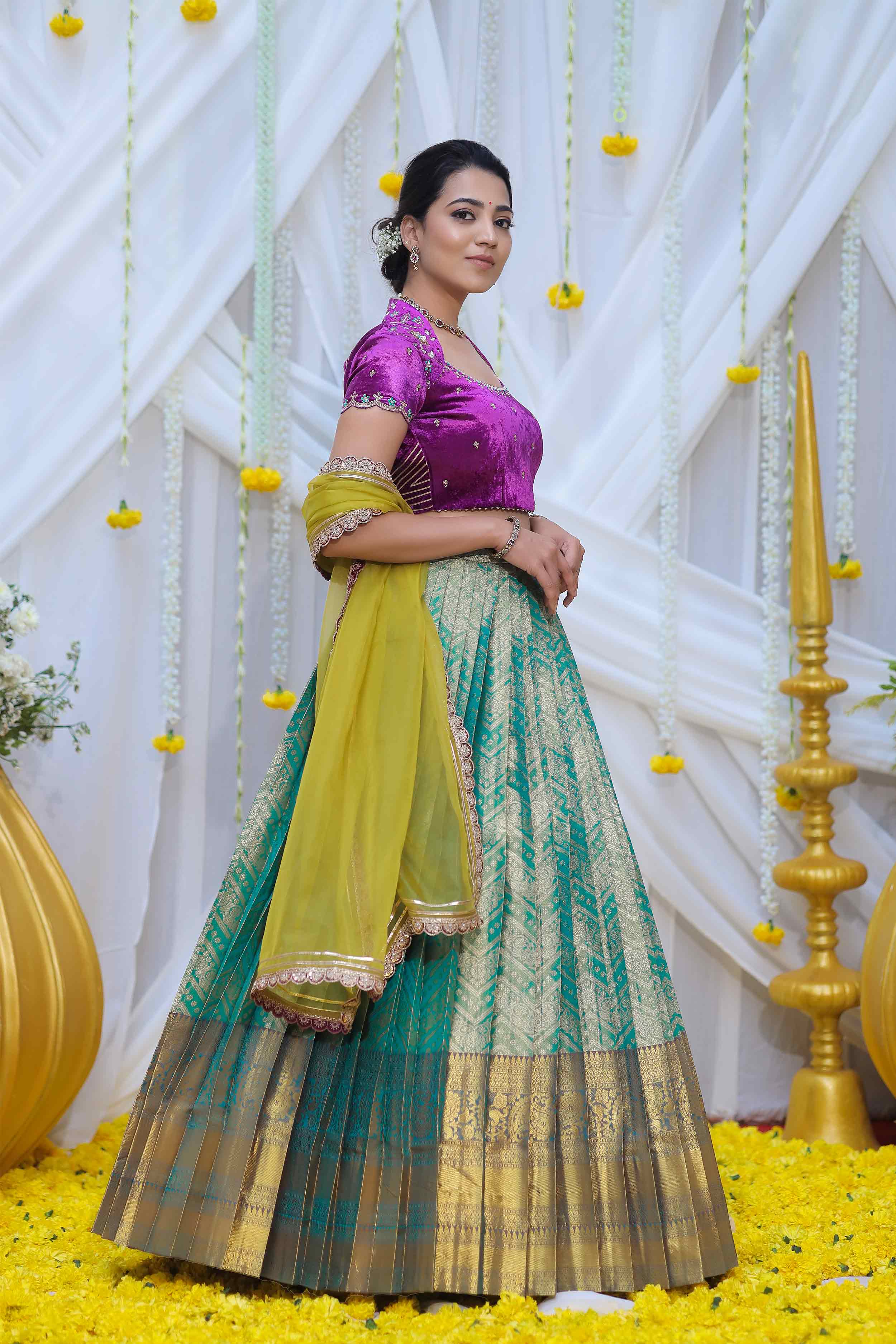 Model in Kaveri Lehenga Set with yellow dupatta