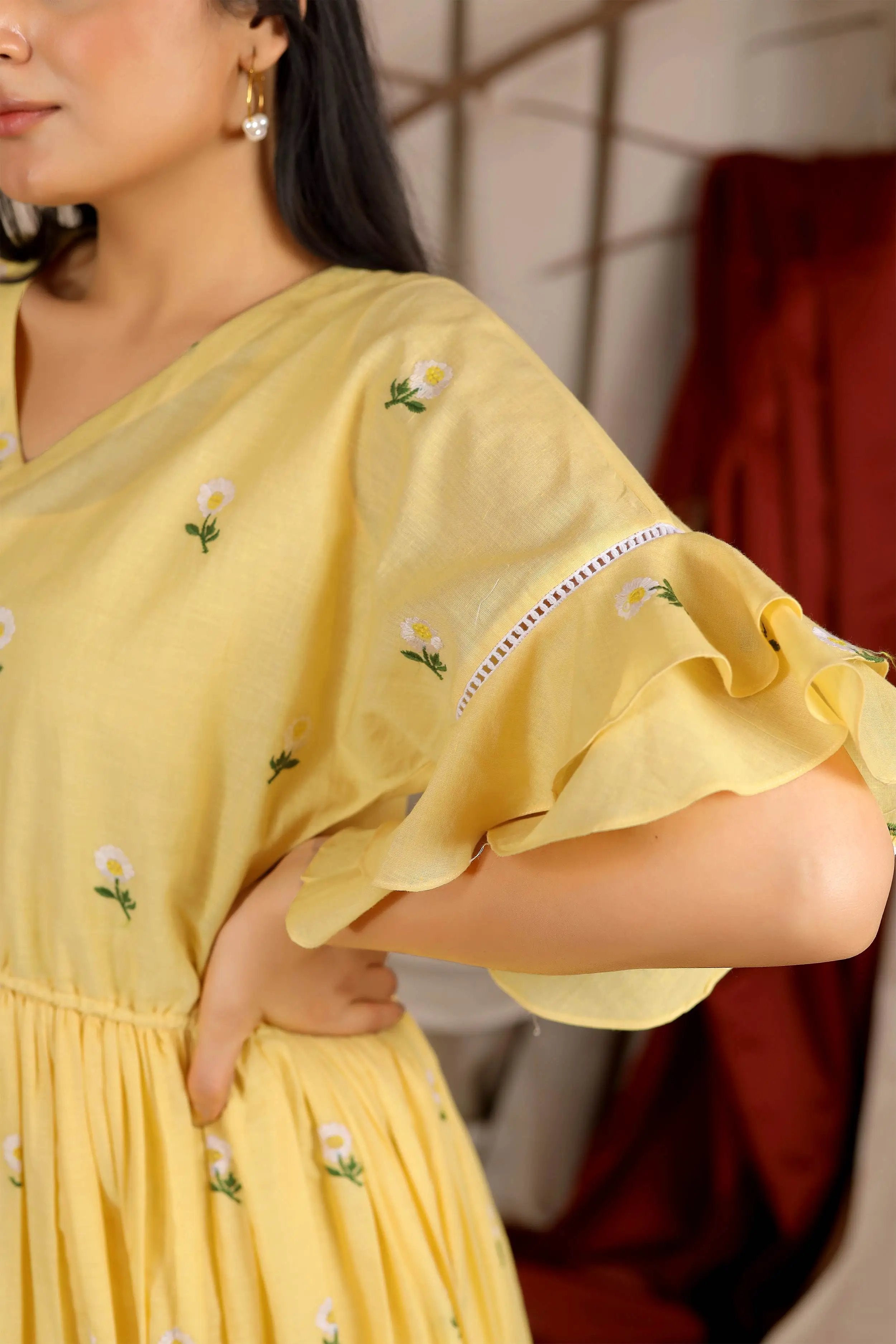 a woman in Lemony Summer Midi Dress in Vanilla Yellow - Bullionknot