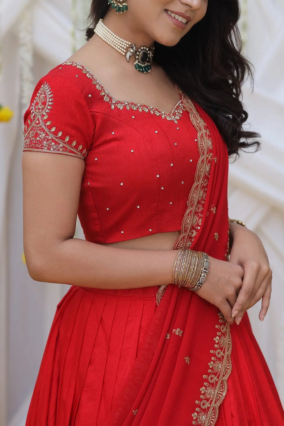 a woman in Maharani Half Saree Set in Red