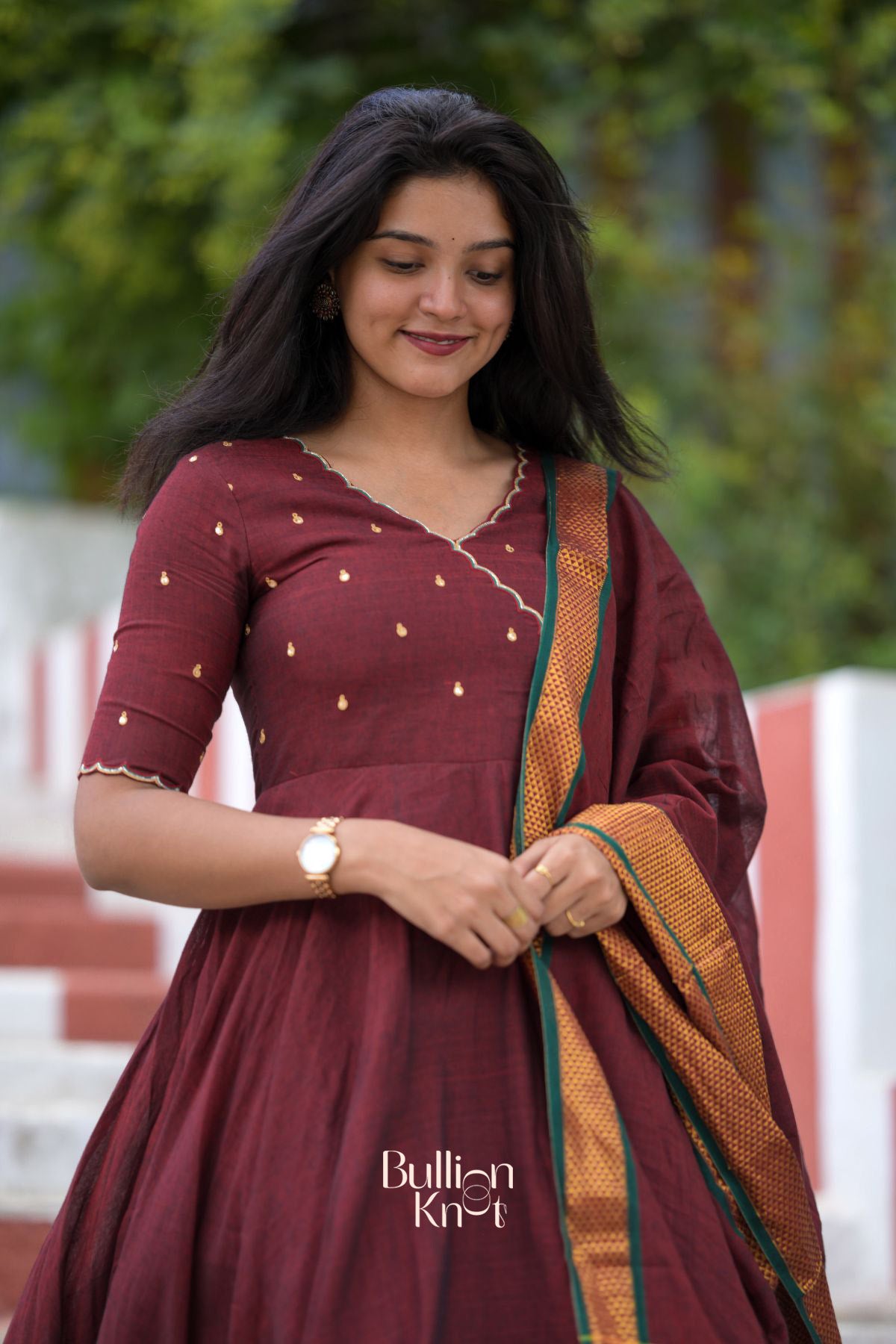 Mokshika Dharwad (Dress) in Maroon