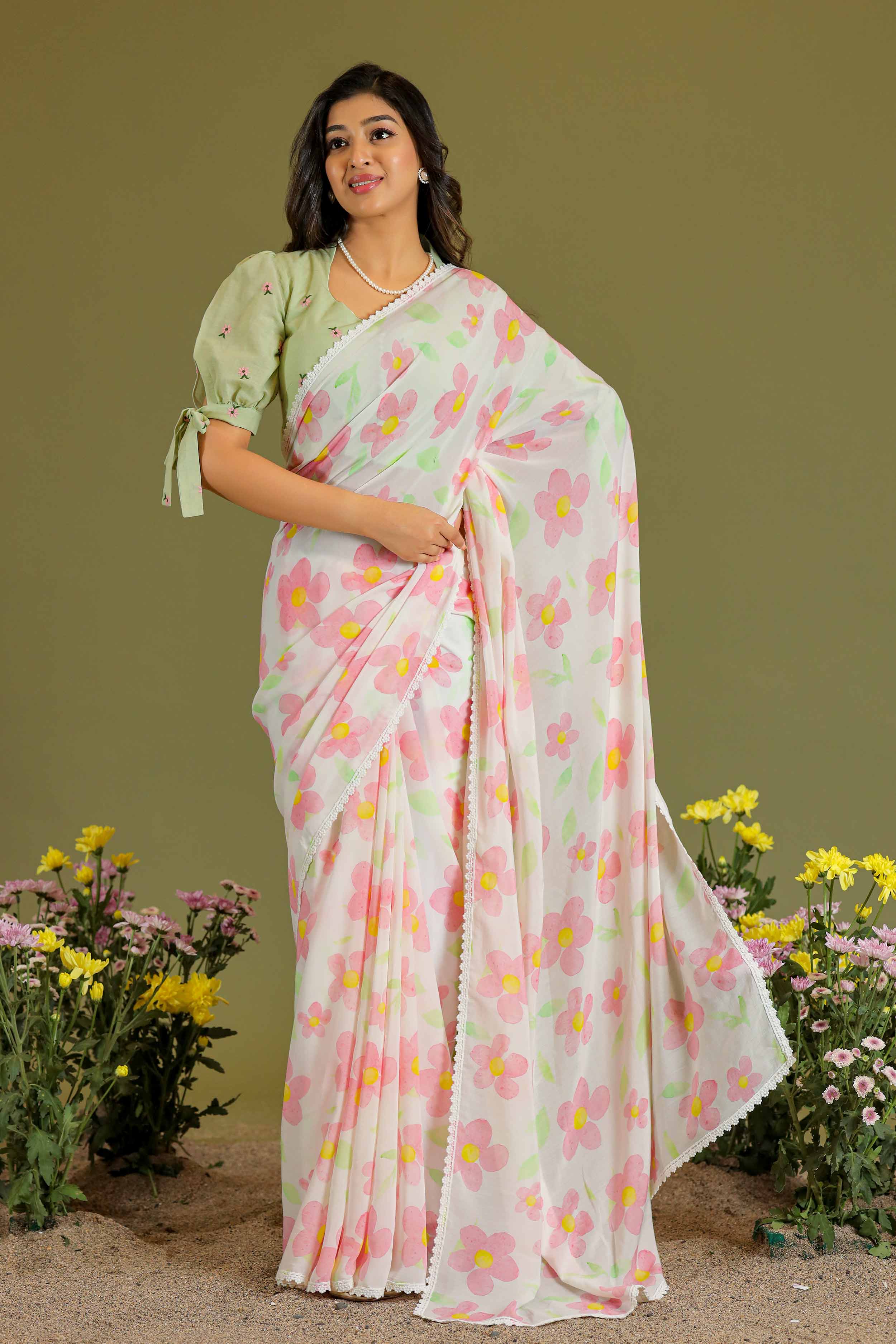a woman in pista & white Phool Podha Saree - Bullionknot