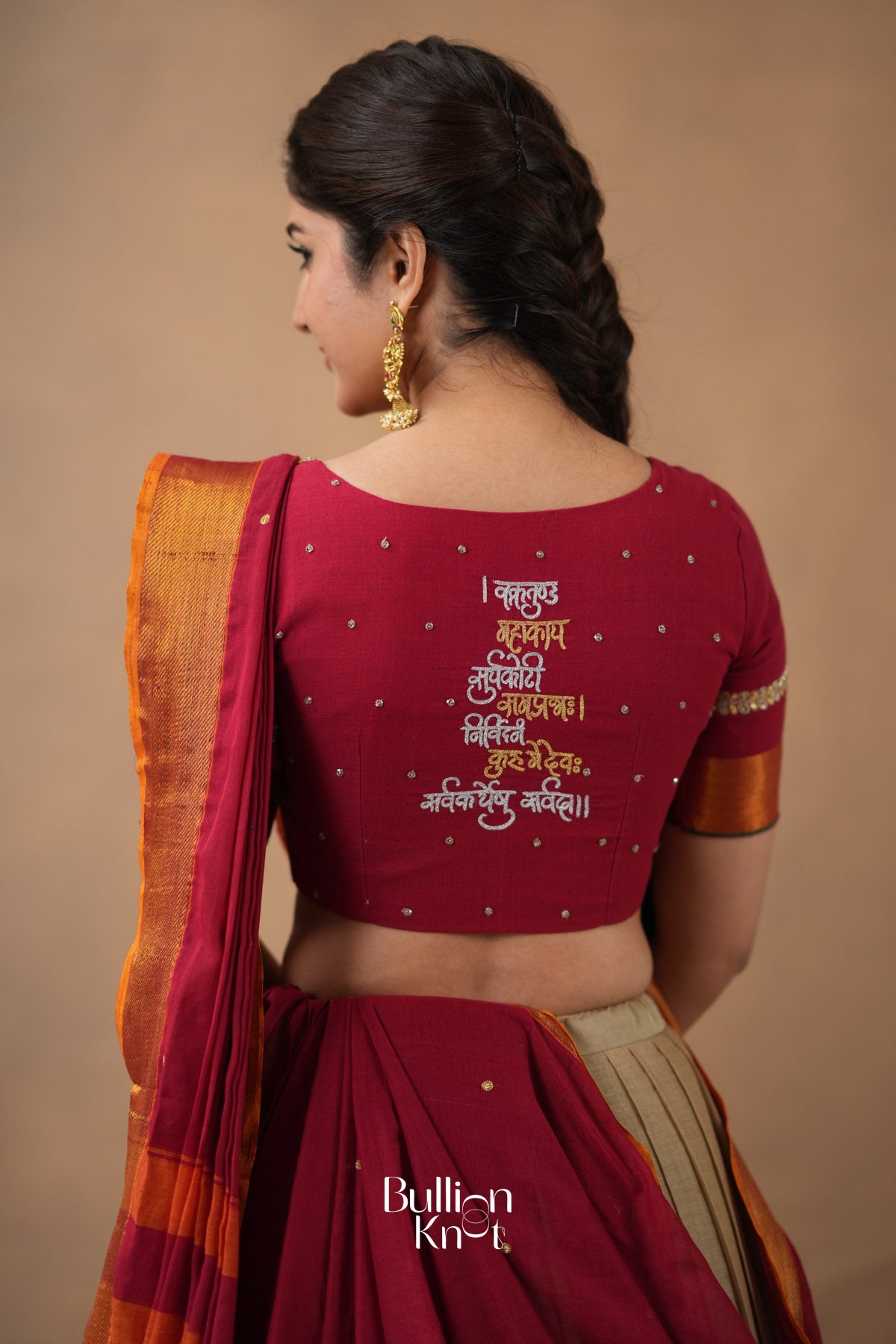Designer blouse featuring heavy traditional Maggam embroidery