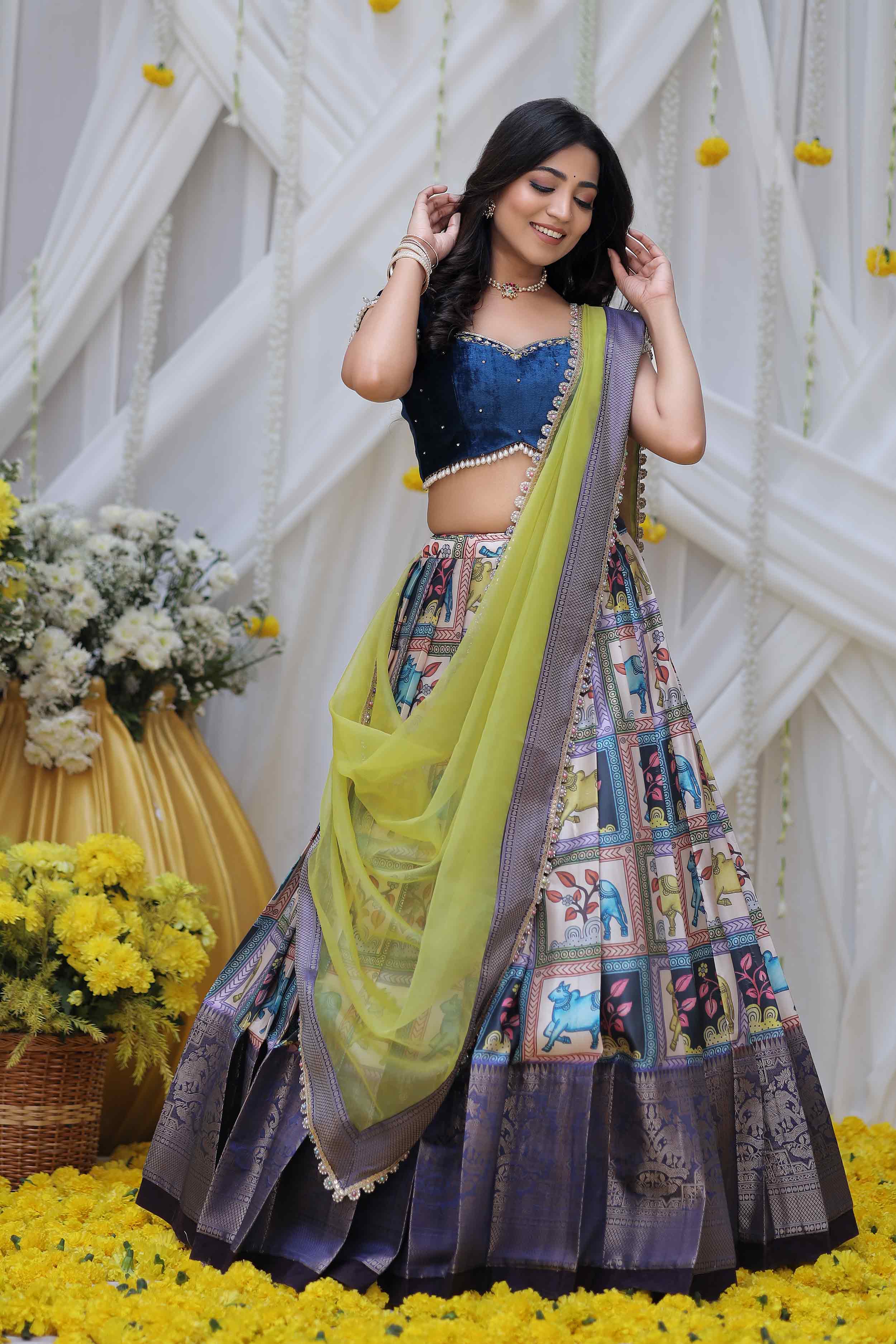 a woman in kalamkari lehenga set