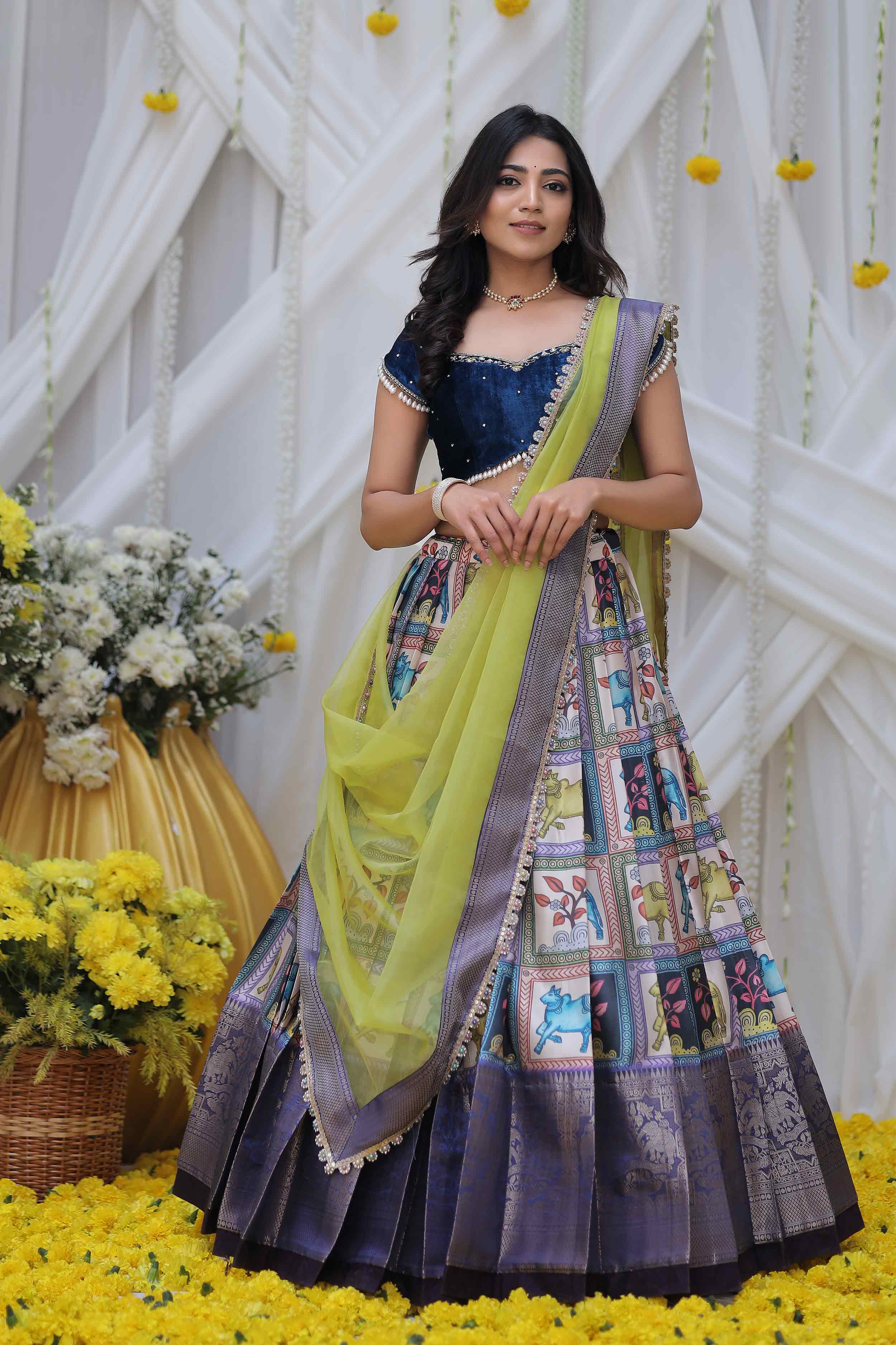 a woman in lehenga suit