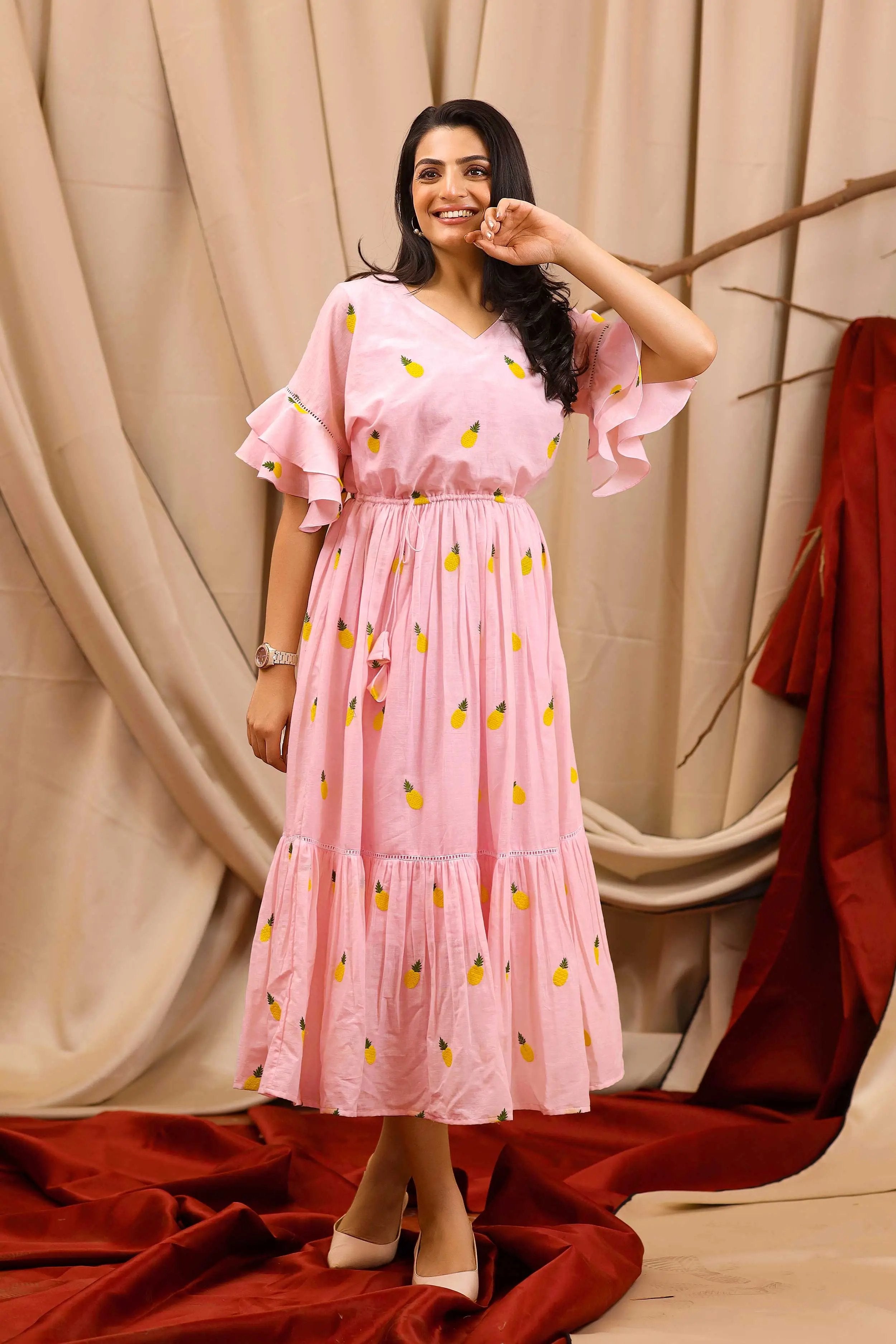 a woman in cotton pink midi dress - Bullionknot