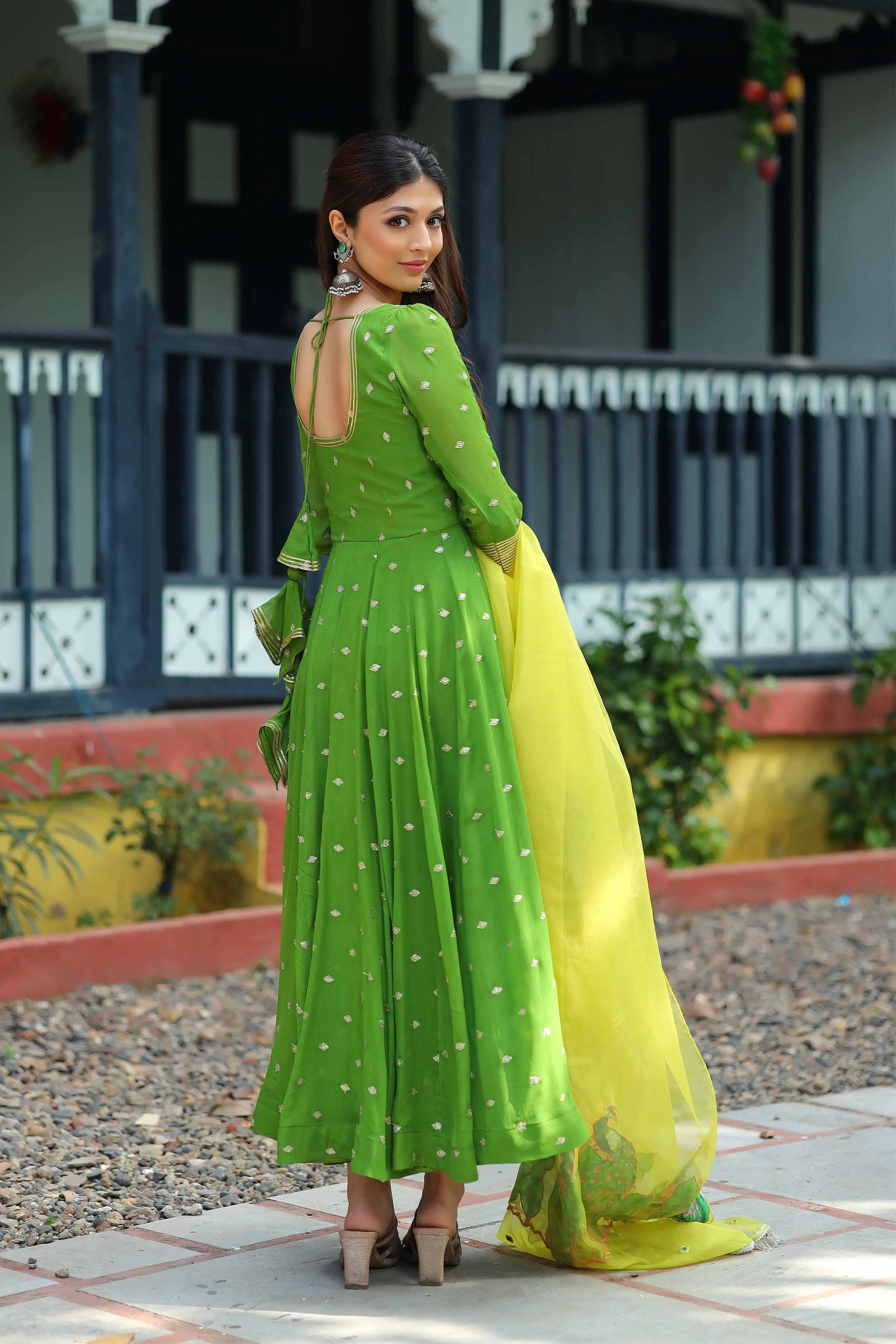 a woman in Green Pattu Pavadai