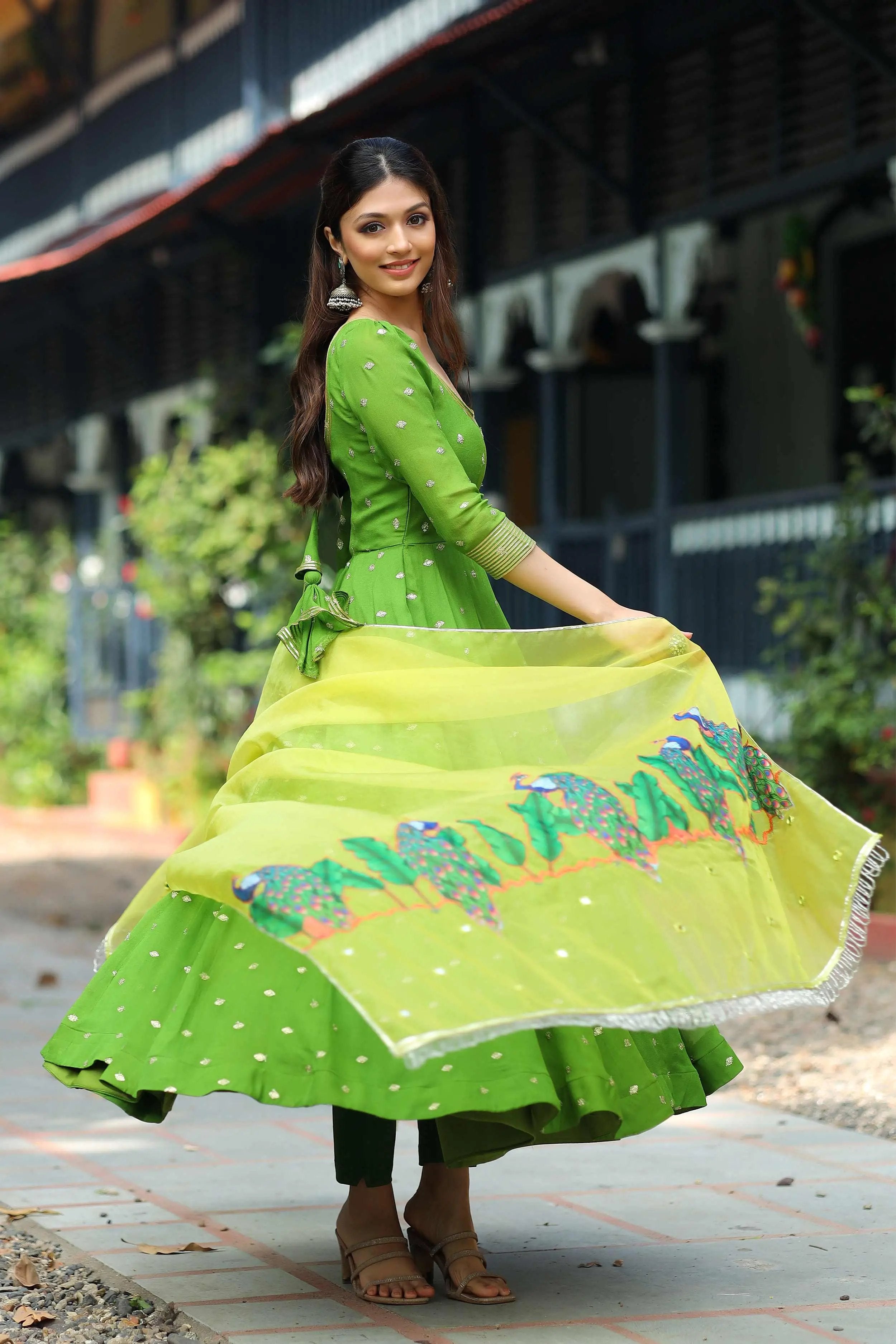a woman in green Anarkali Dress