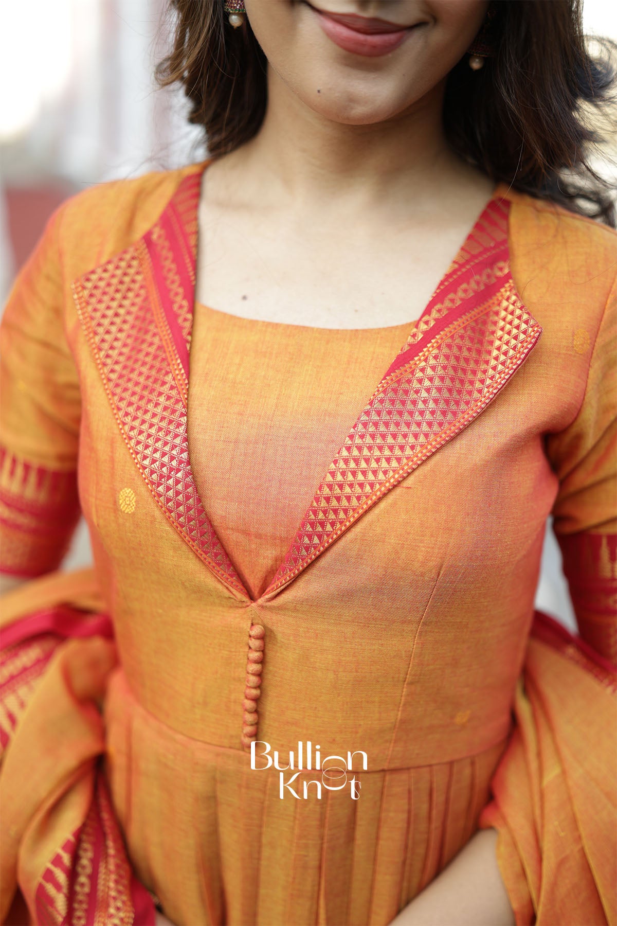 Pravika Handloom Orange Anarkali Suit Set