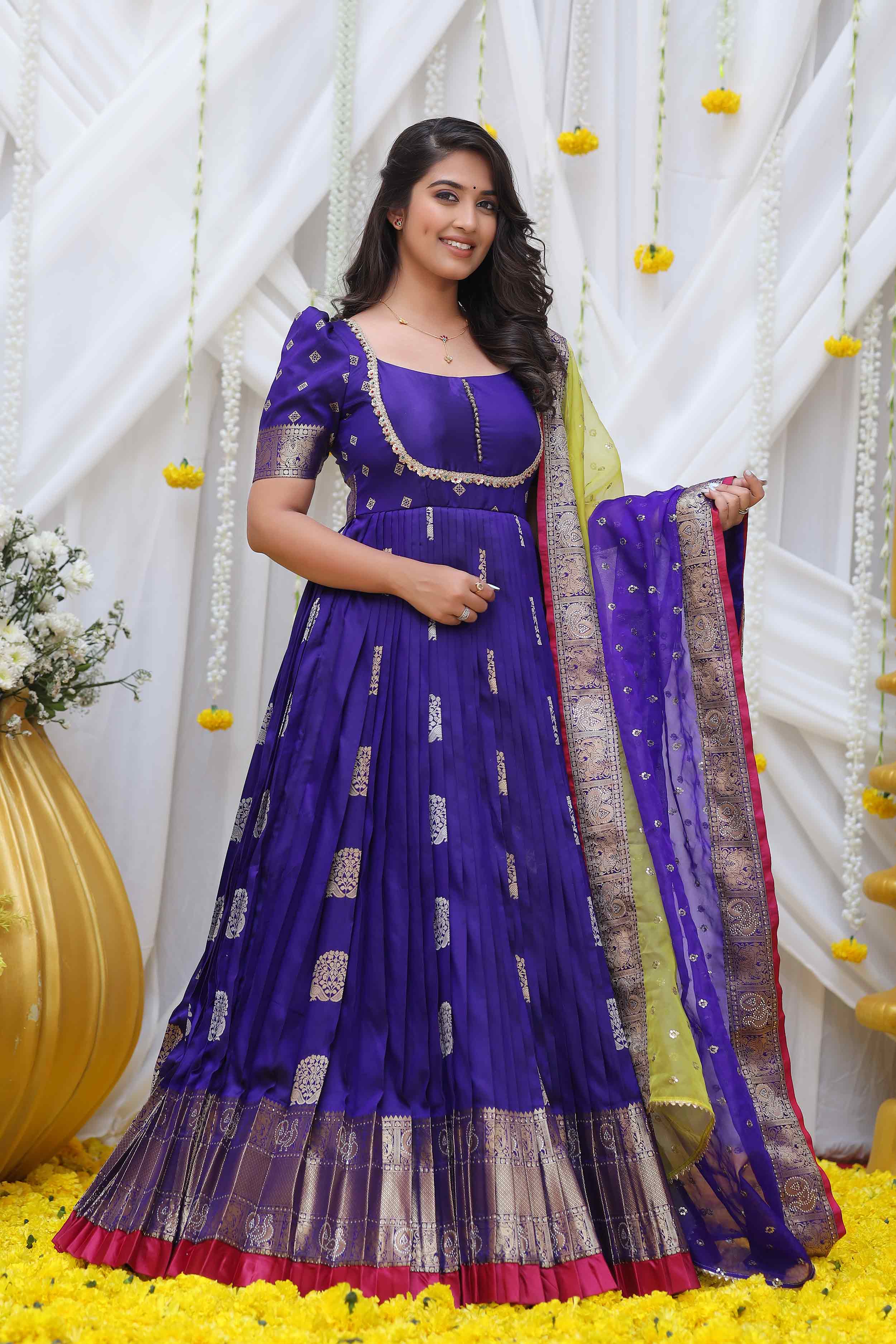 a woman in pattu dress