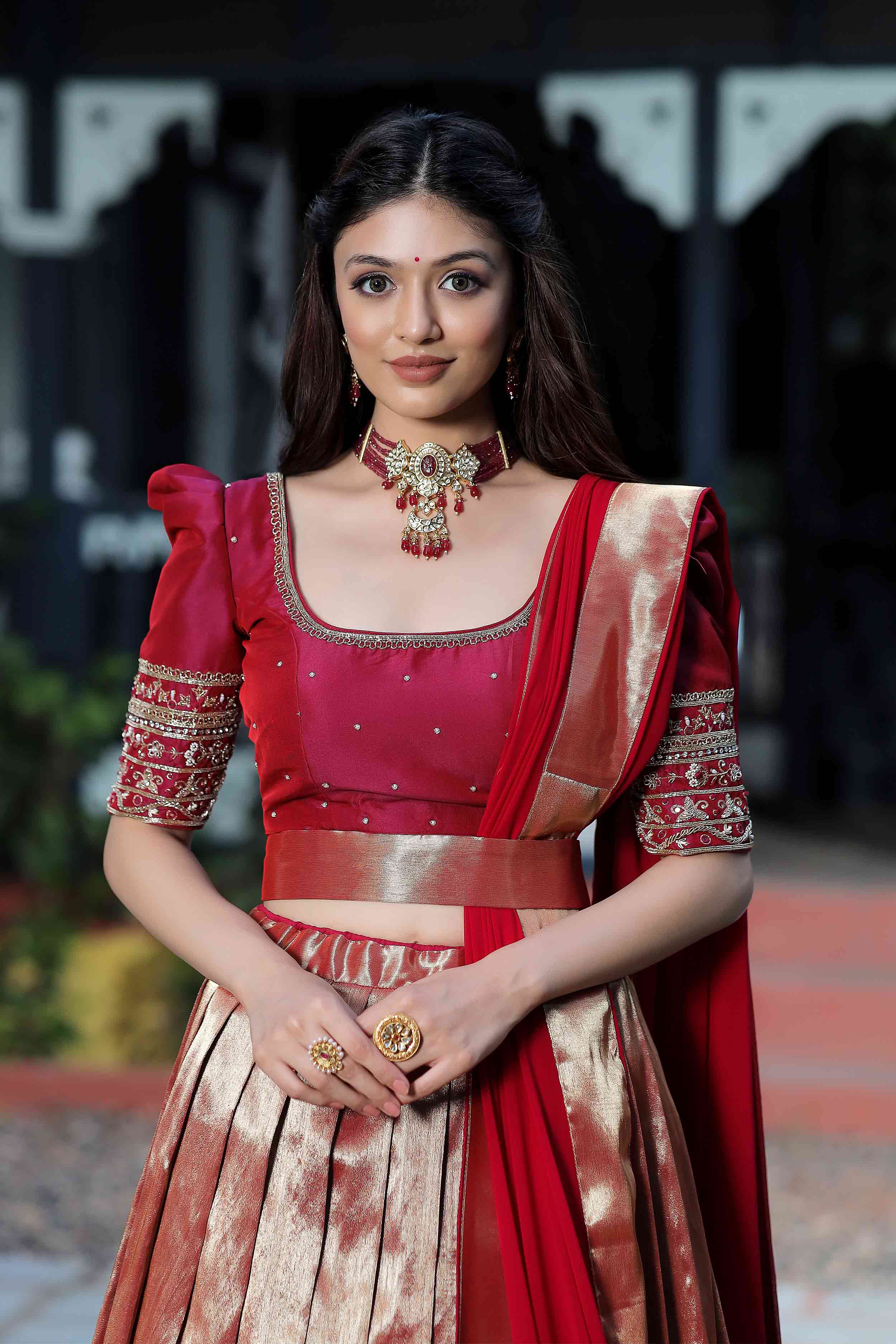 a woman in red lehenga