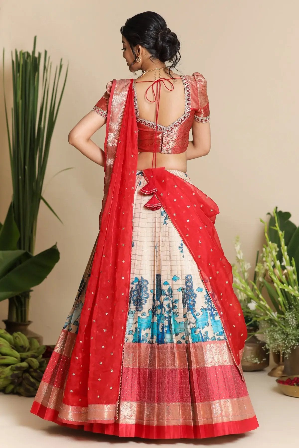 Back view of Saloni Banarasi Lehenga Set in Red with tie detail