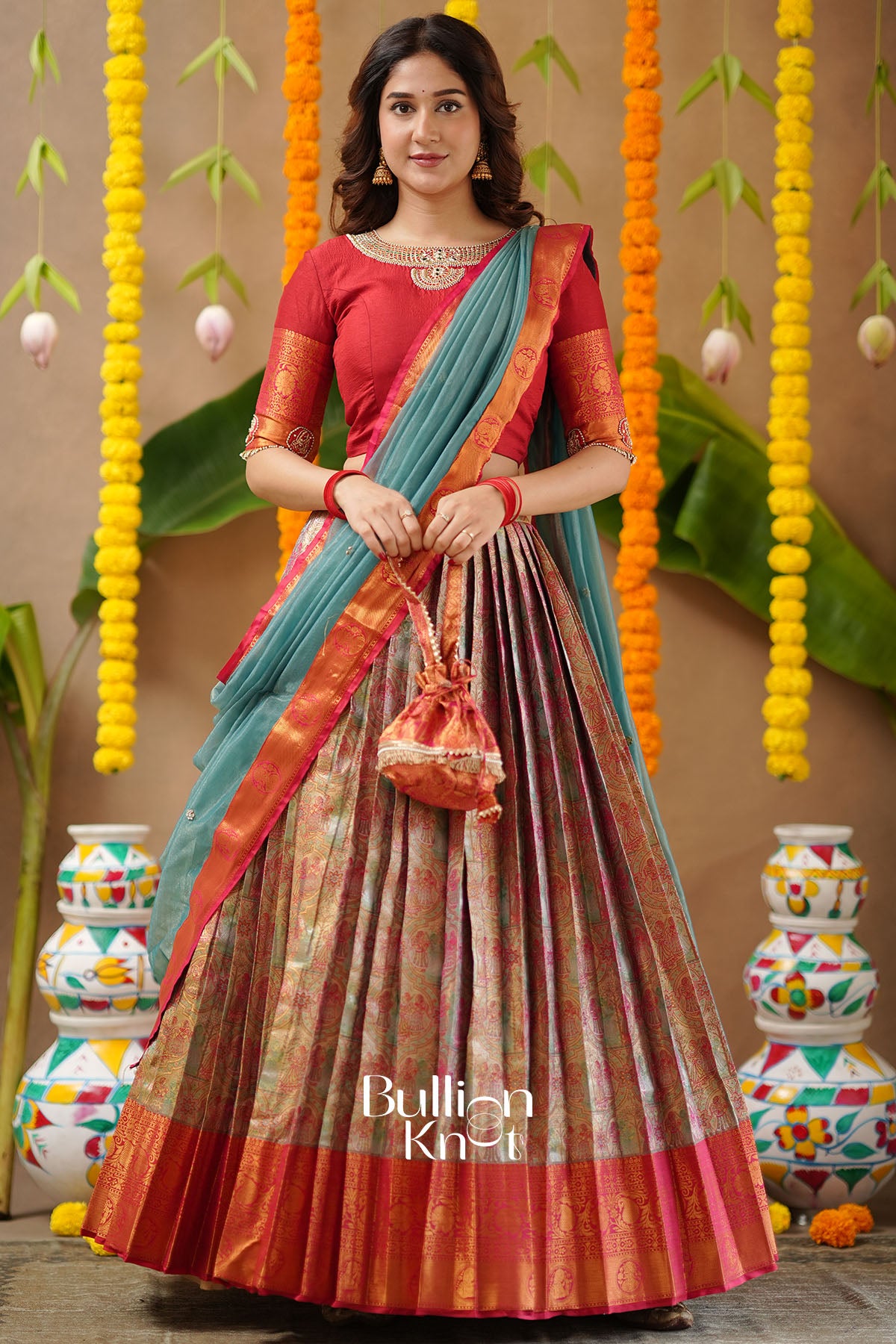 Designer Red Semi-Kanjivaram Silk Lehenga Set with Potli Purse – BullionKnot product image.