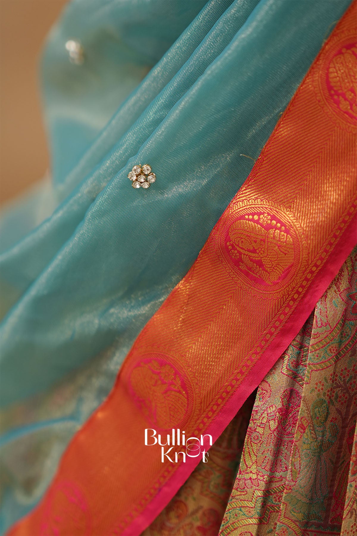 Designer dupatta with delicate handwork and rich fabric detailing.
