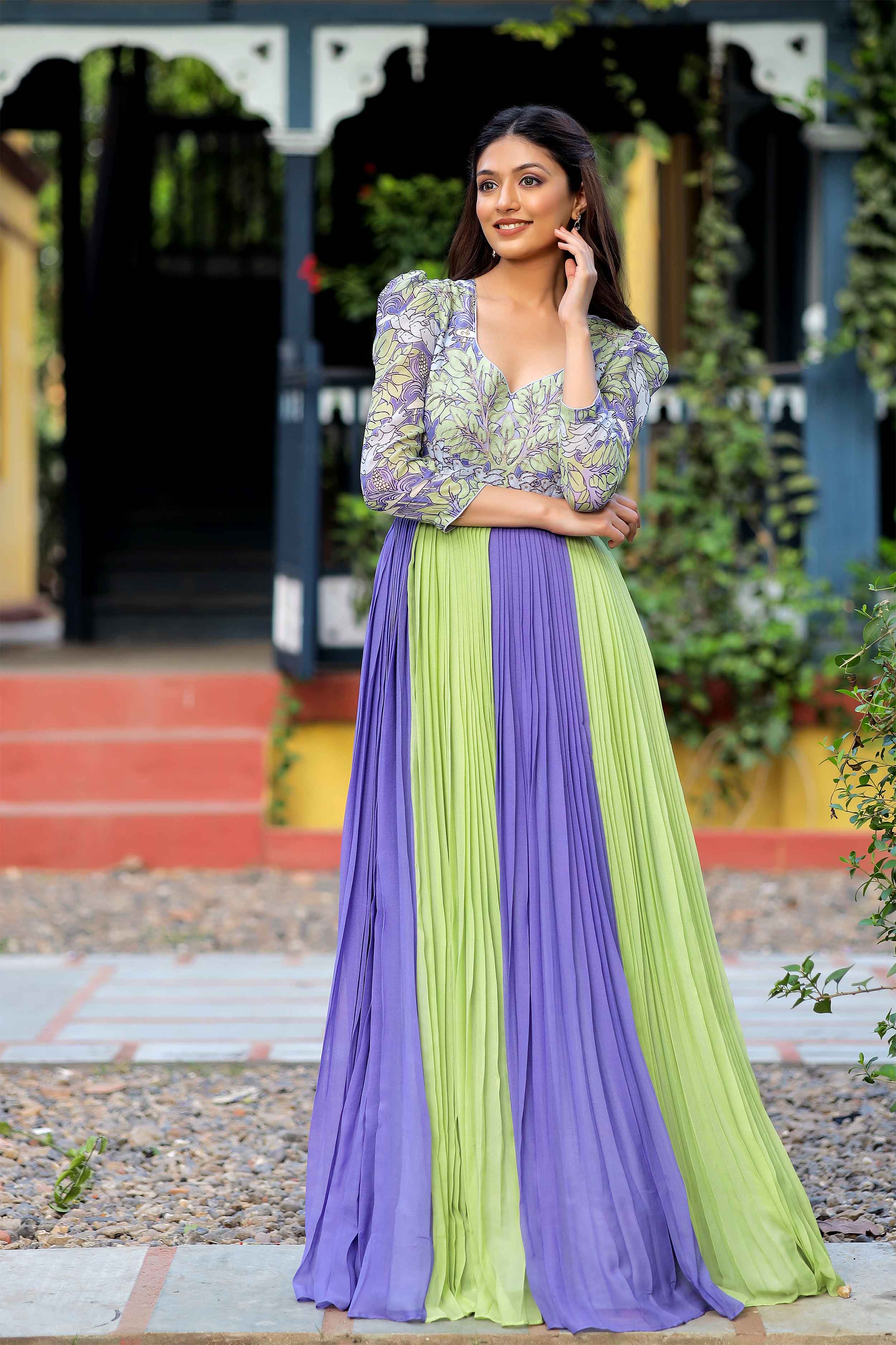 a woman in lilac long dress
