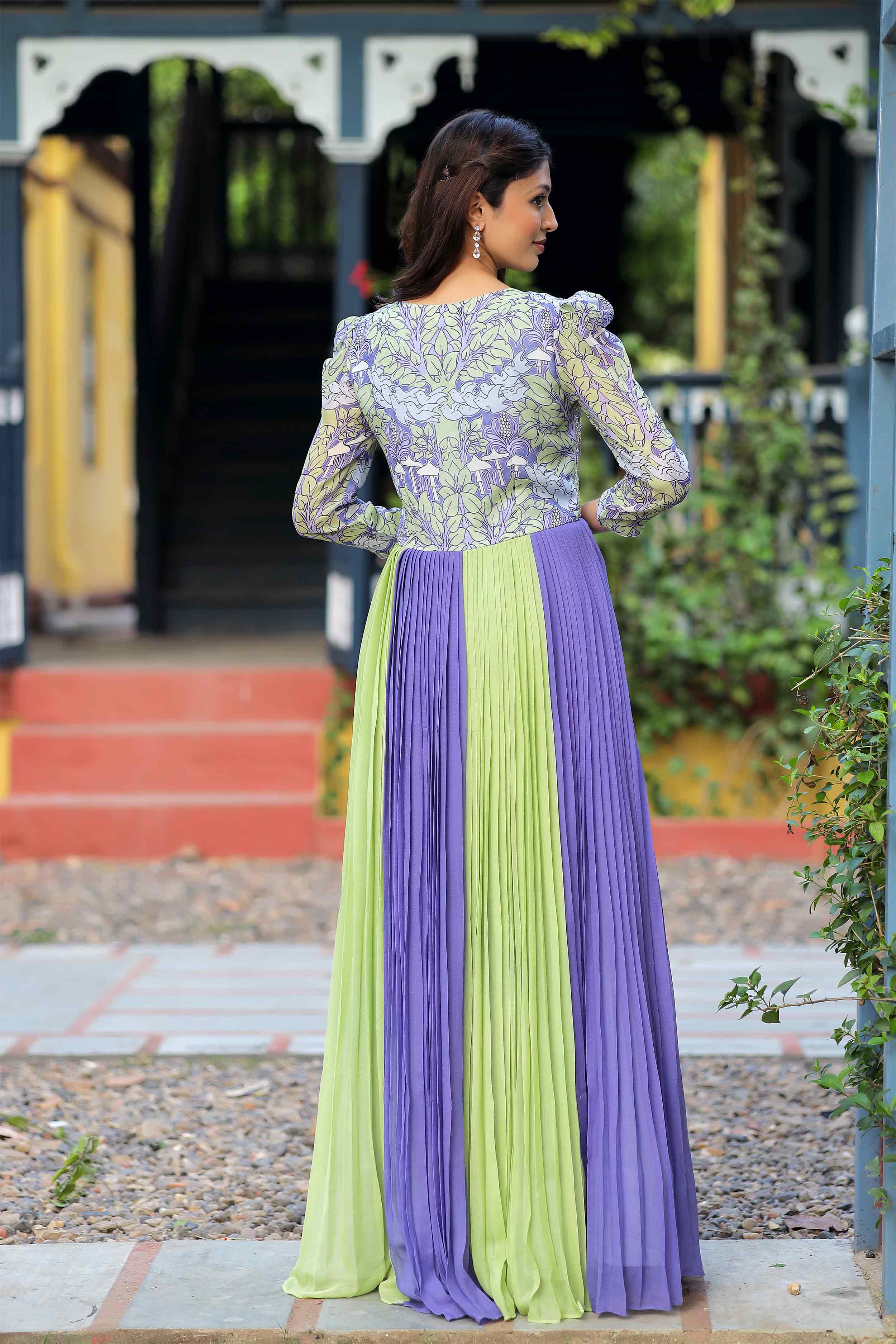 a woman in violet long dress