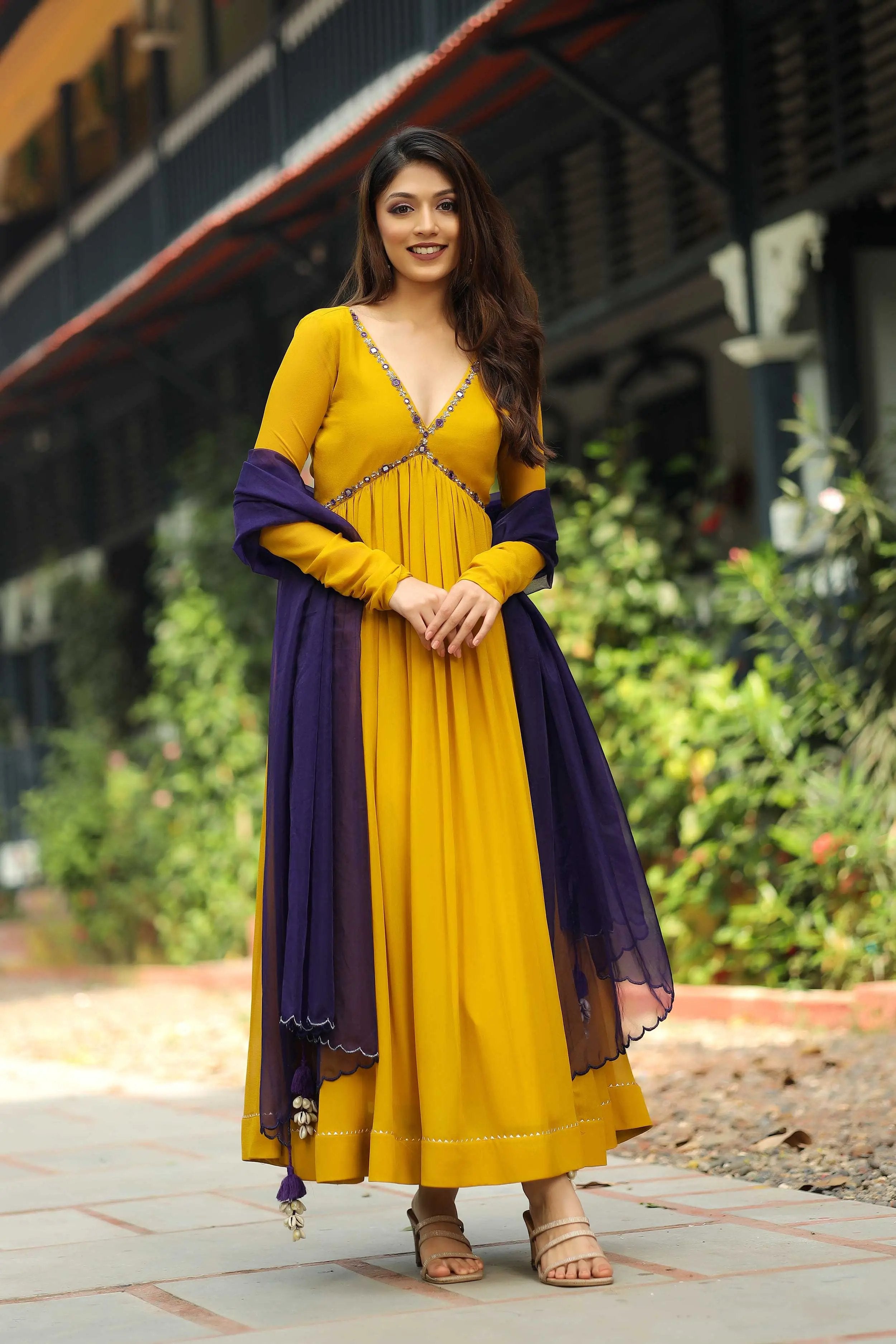 a woman in yellow Anarkali Dress