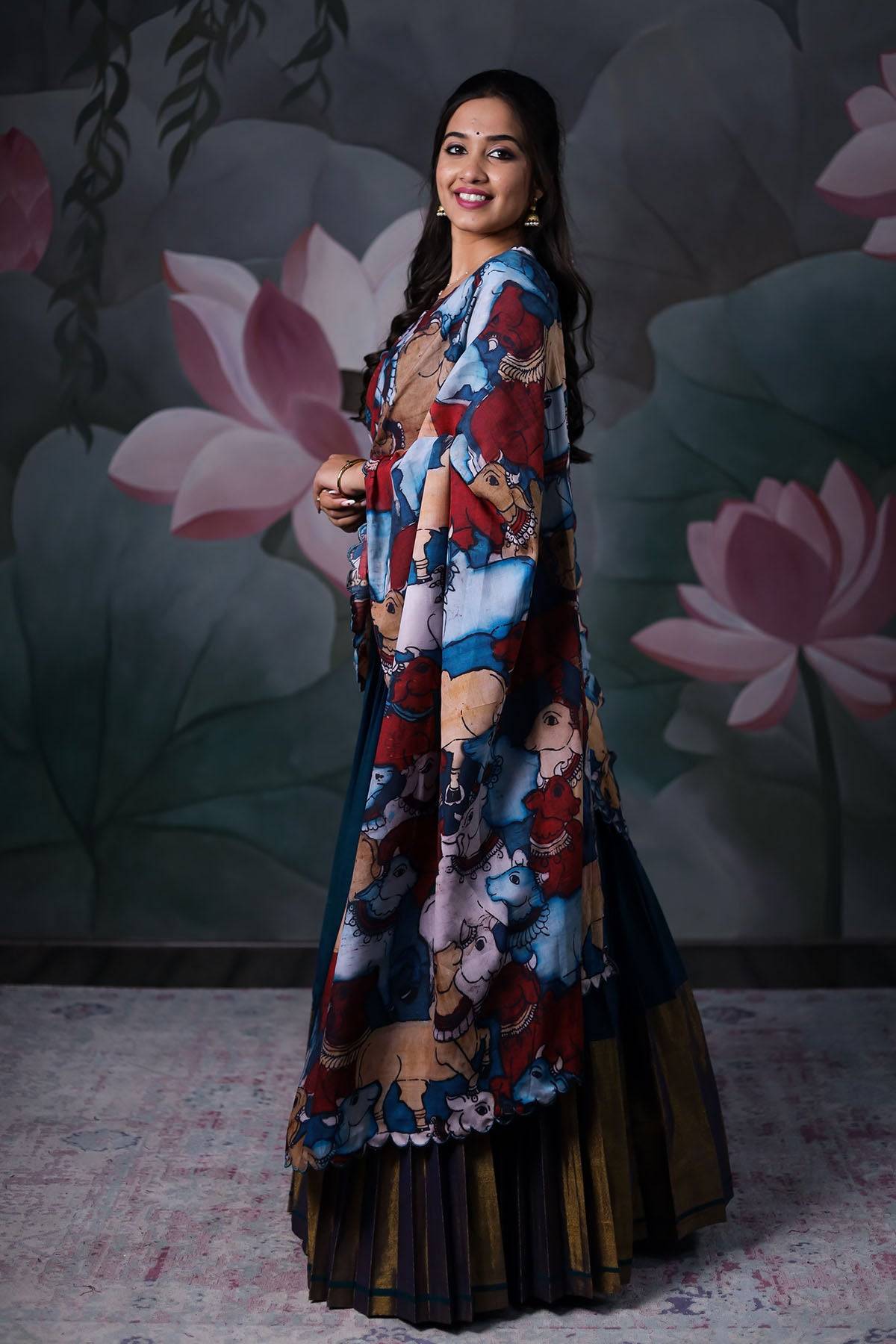 a model posing with dark blue Handloom Lehenga dress with cotton dupatta from Bullionknot