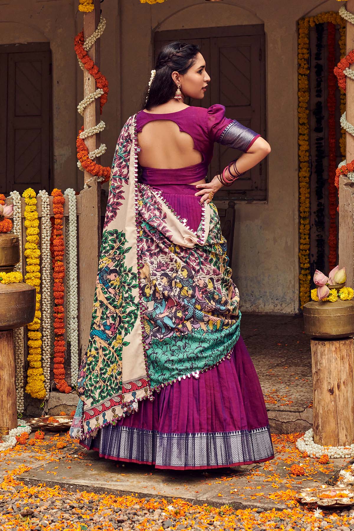 a woman in Lehenga Suit