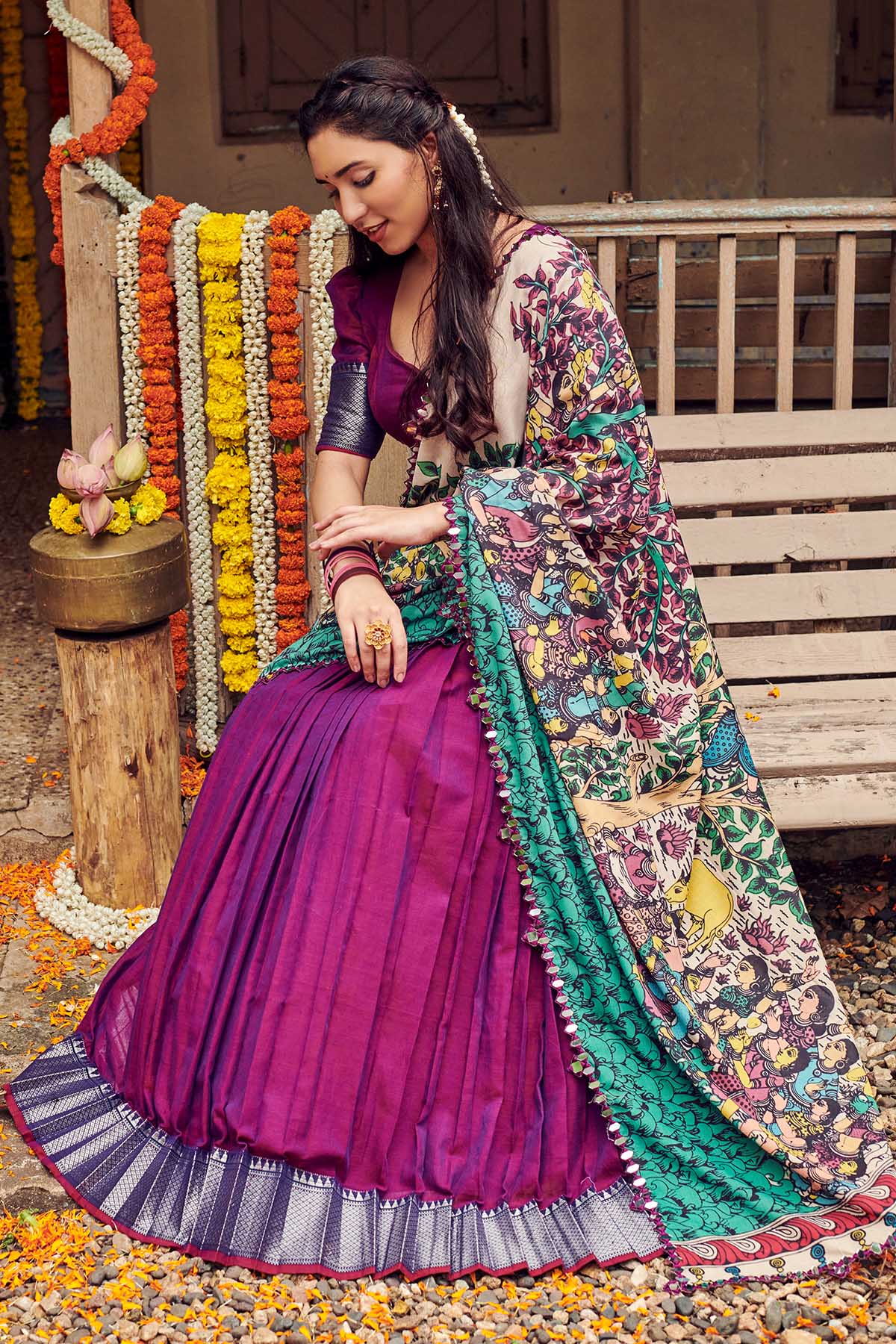 a woman in half saree