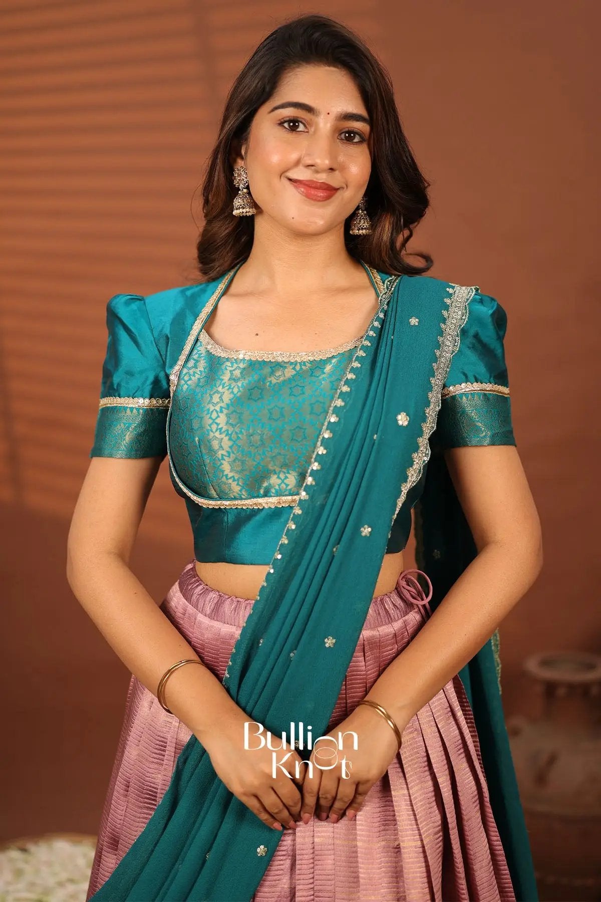 Mayurika Teal Blue and Baby Pink Silk Lehenga Set