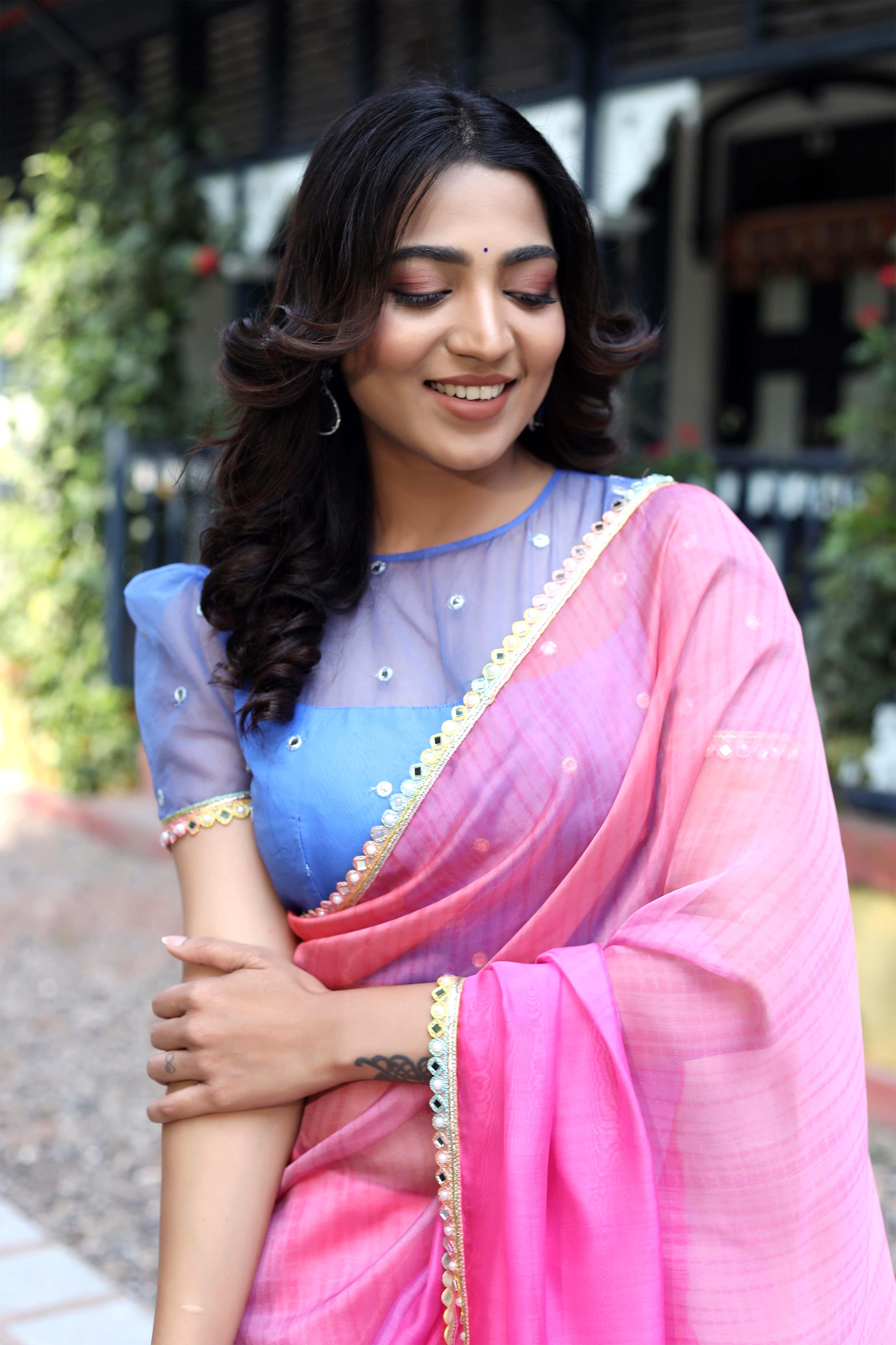 a woman in organza saree