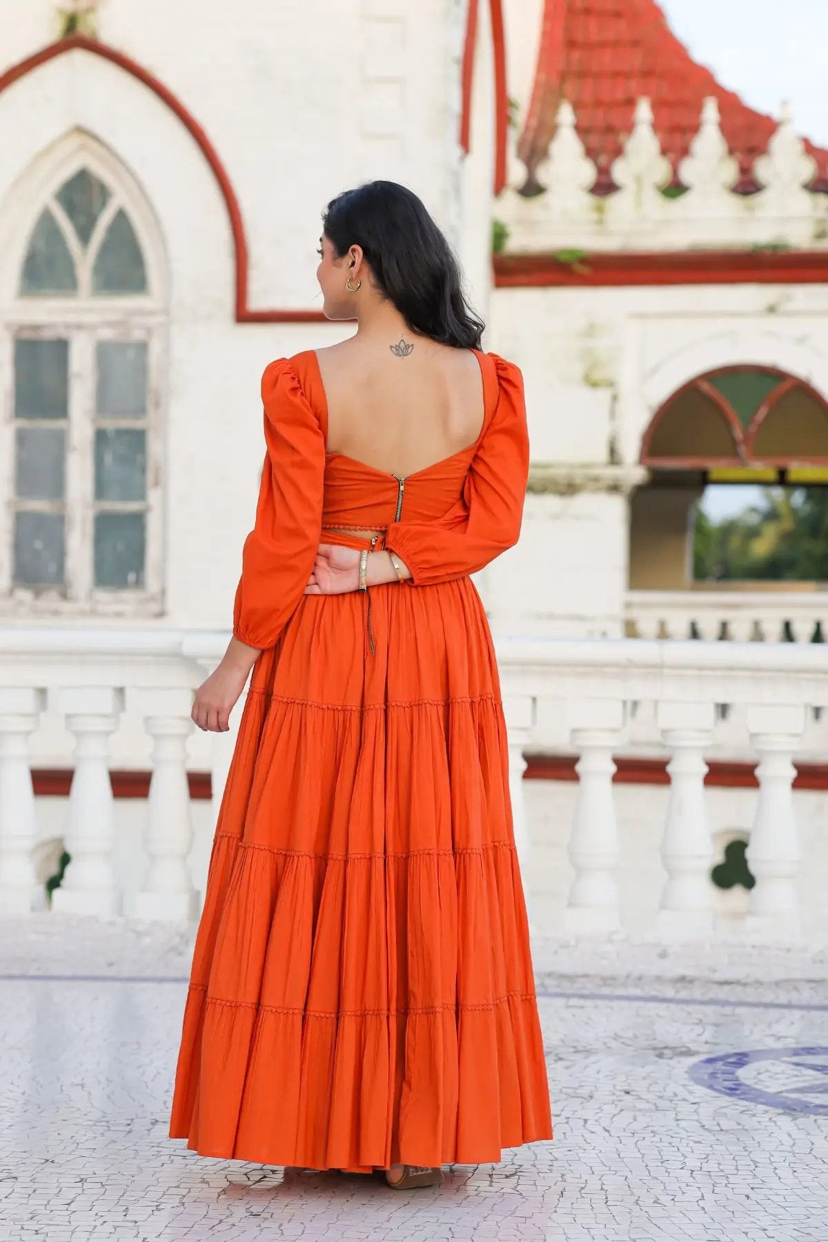 Back view of orange lehenga with zipper detail