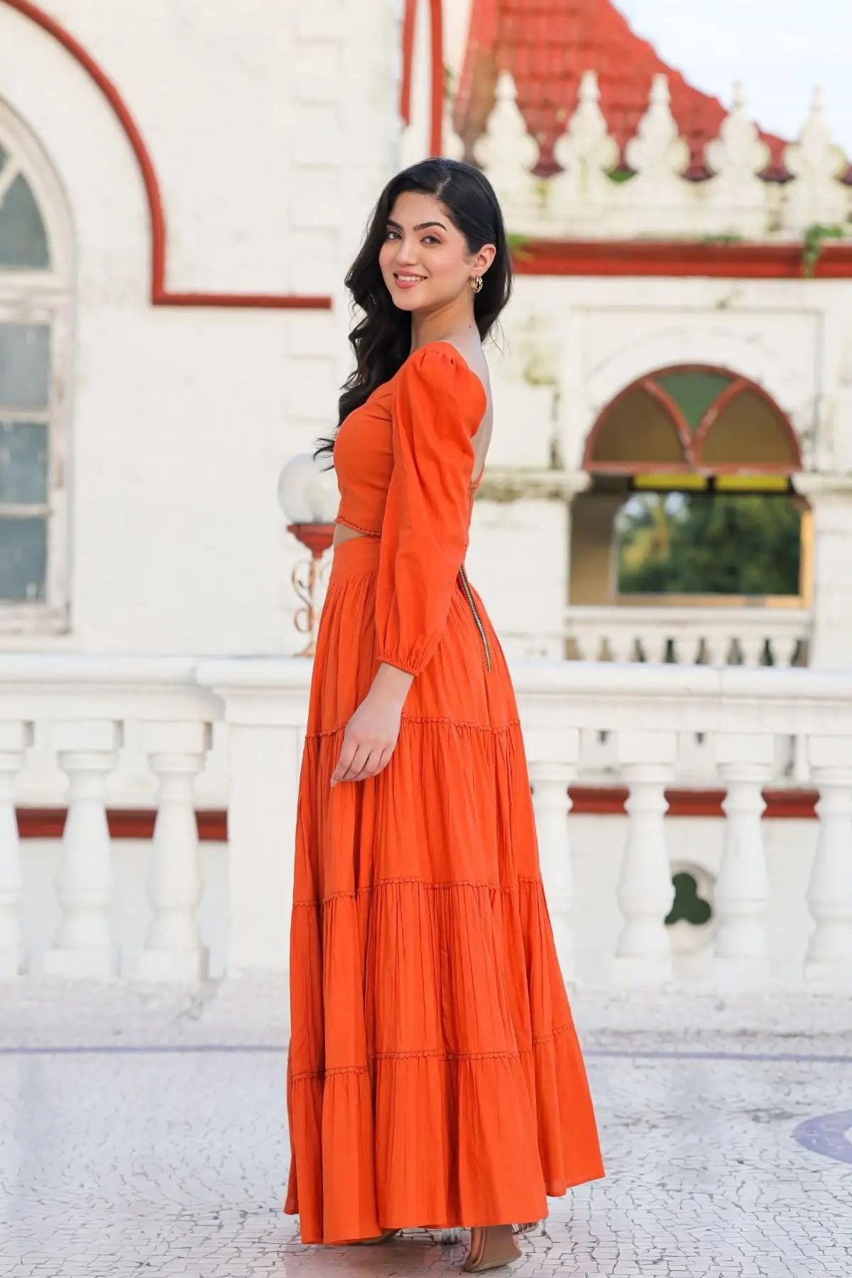 Side view of orange lehenga with crop top