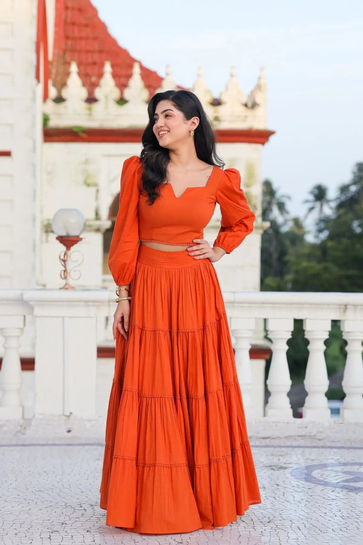 Chic orange lehenga set with long skirt