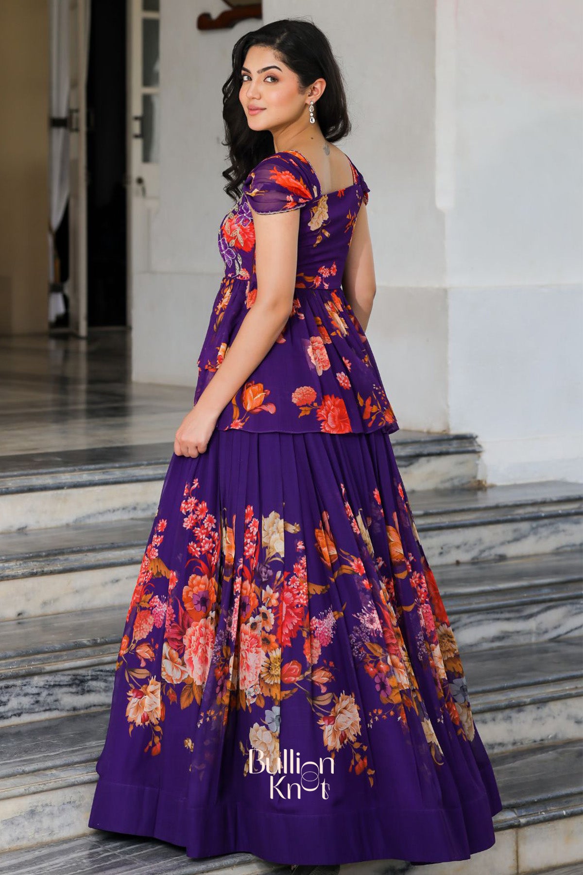 Stylish Ziana Indo-Western gown with red and peach floral details
